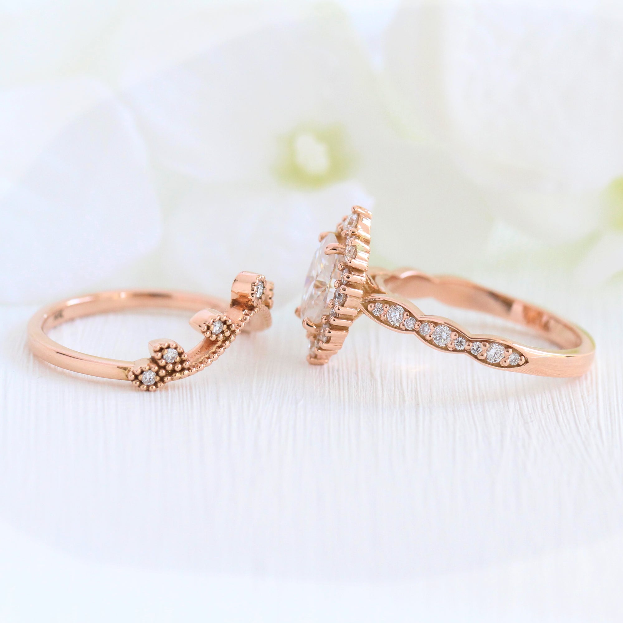 oval moissanite engagement ring rose gold halo diamond bridal set and leaf diamond wedding band by la more design jewelry