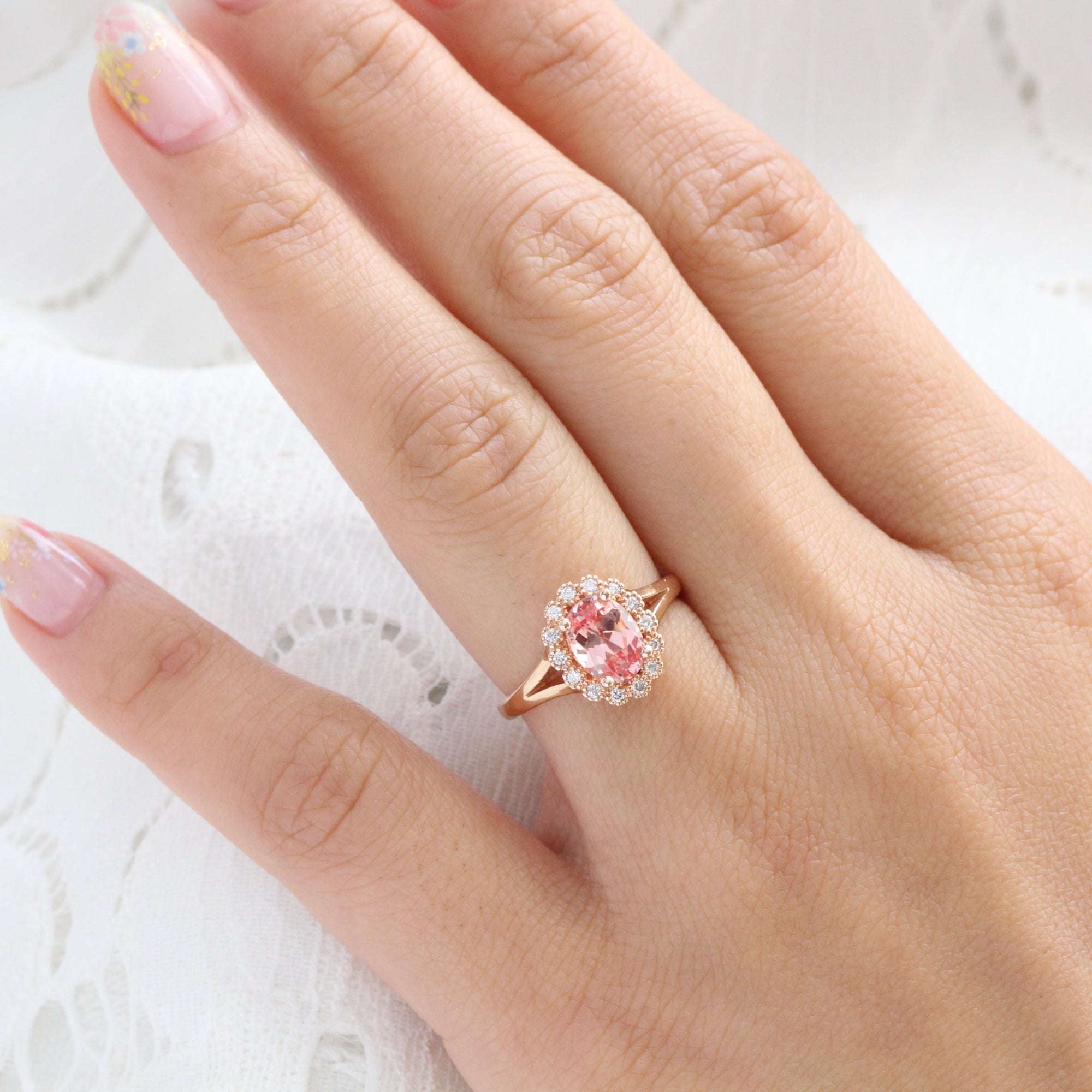 oval peach sapphire engagement ring in rose gold halo diamond band by la more design jewelry