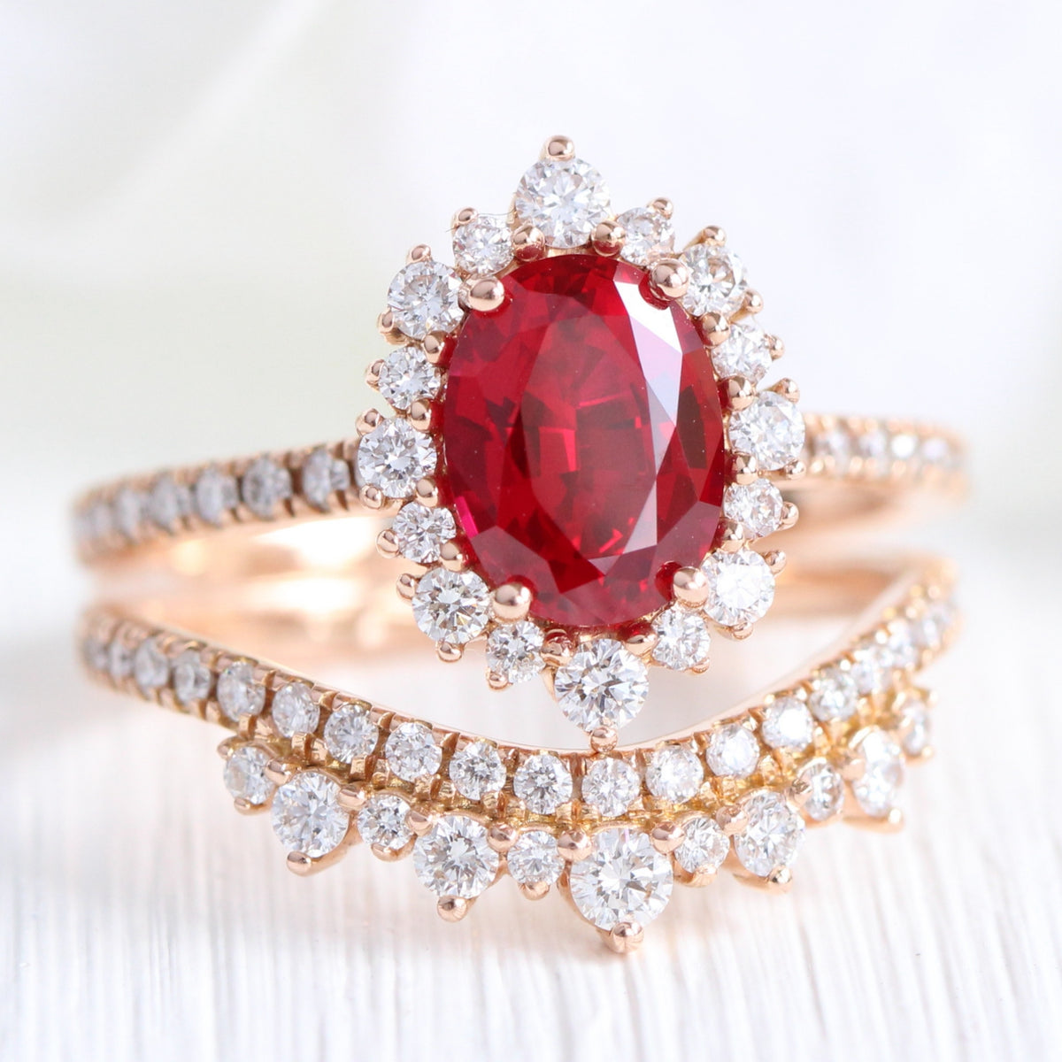 oval ruby engagement ring rose gold halo diamond bridal set and crown diamond wedding band by la more design jewelry-2