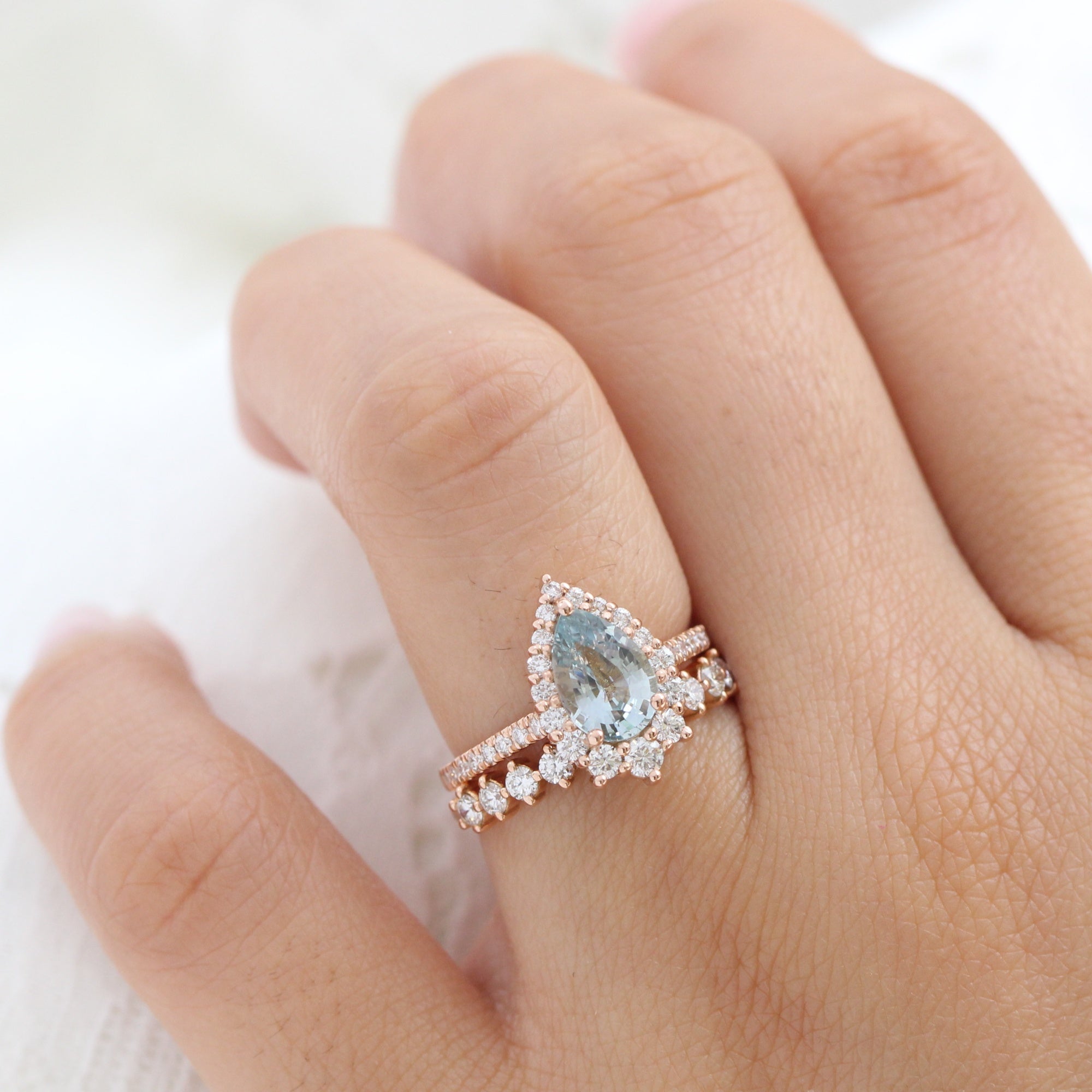 pastel blue sapphire ring rose gold halo diamond pear engagement ring la more design jewelry