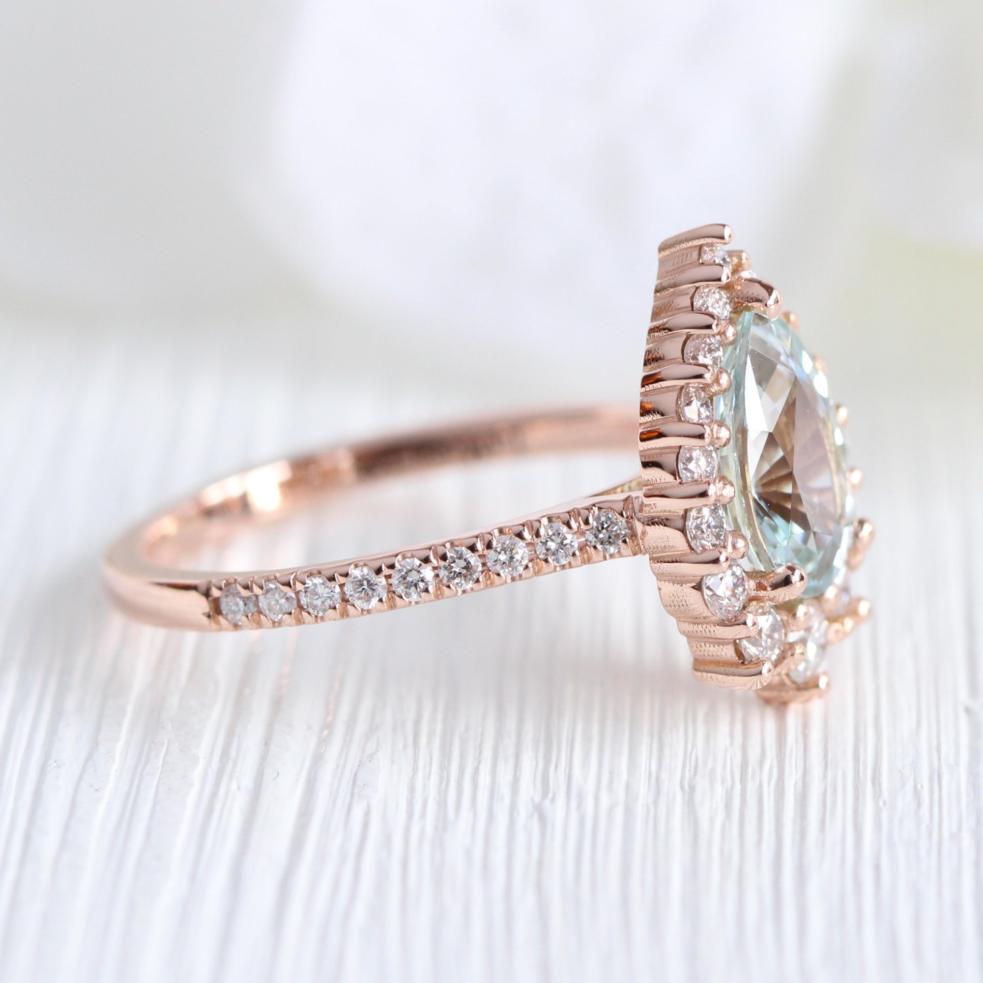 pastel blue sapphire ring rose gold halo diamond pear engagement ring la more design jewelry