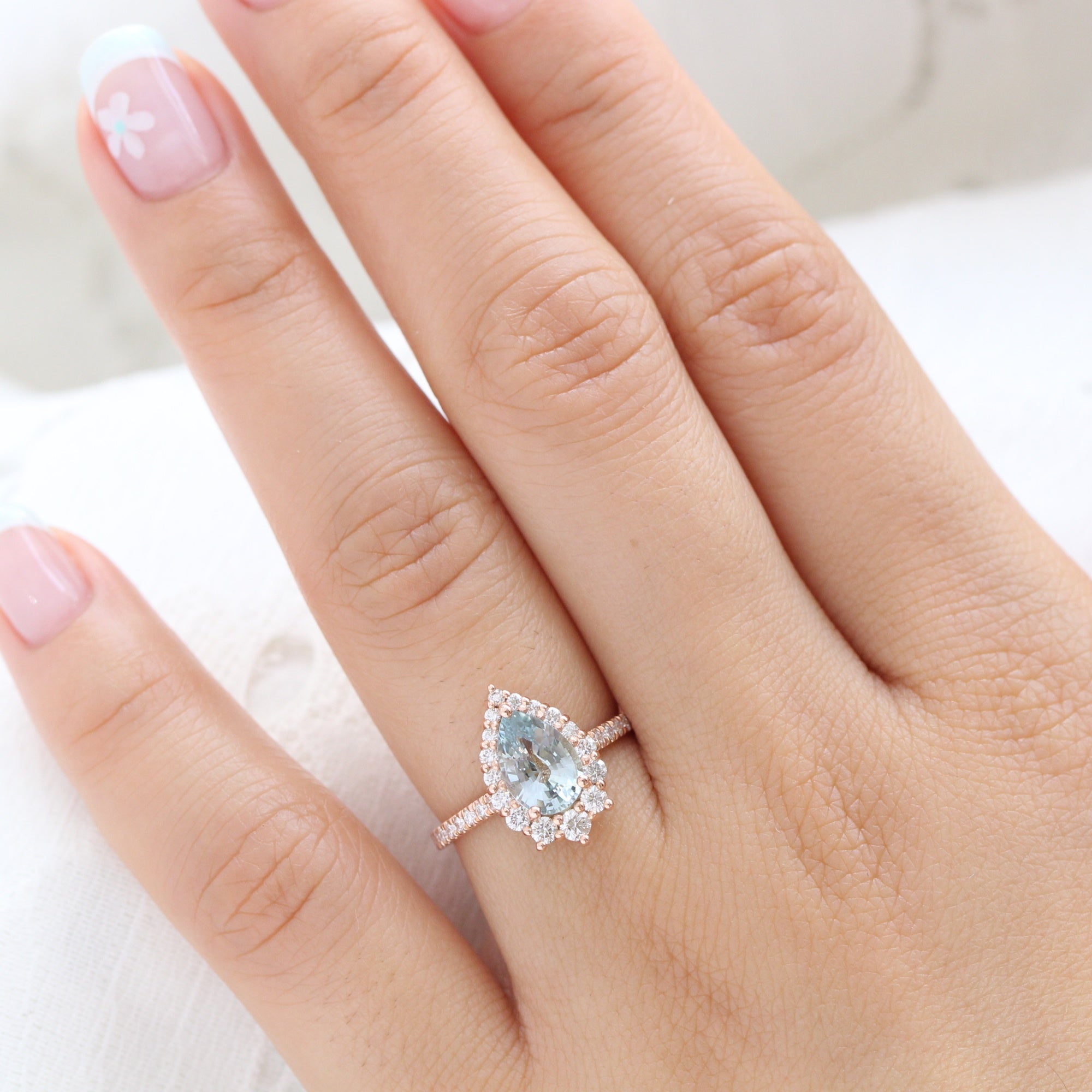 pastel blue sapphire ring rose gold halo diamond pear engagement ring la more design jewelry