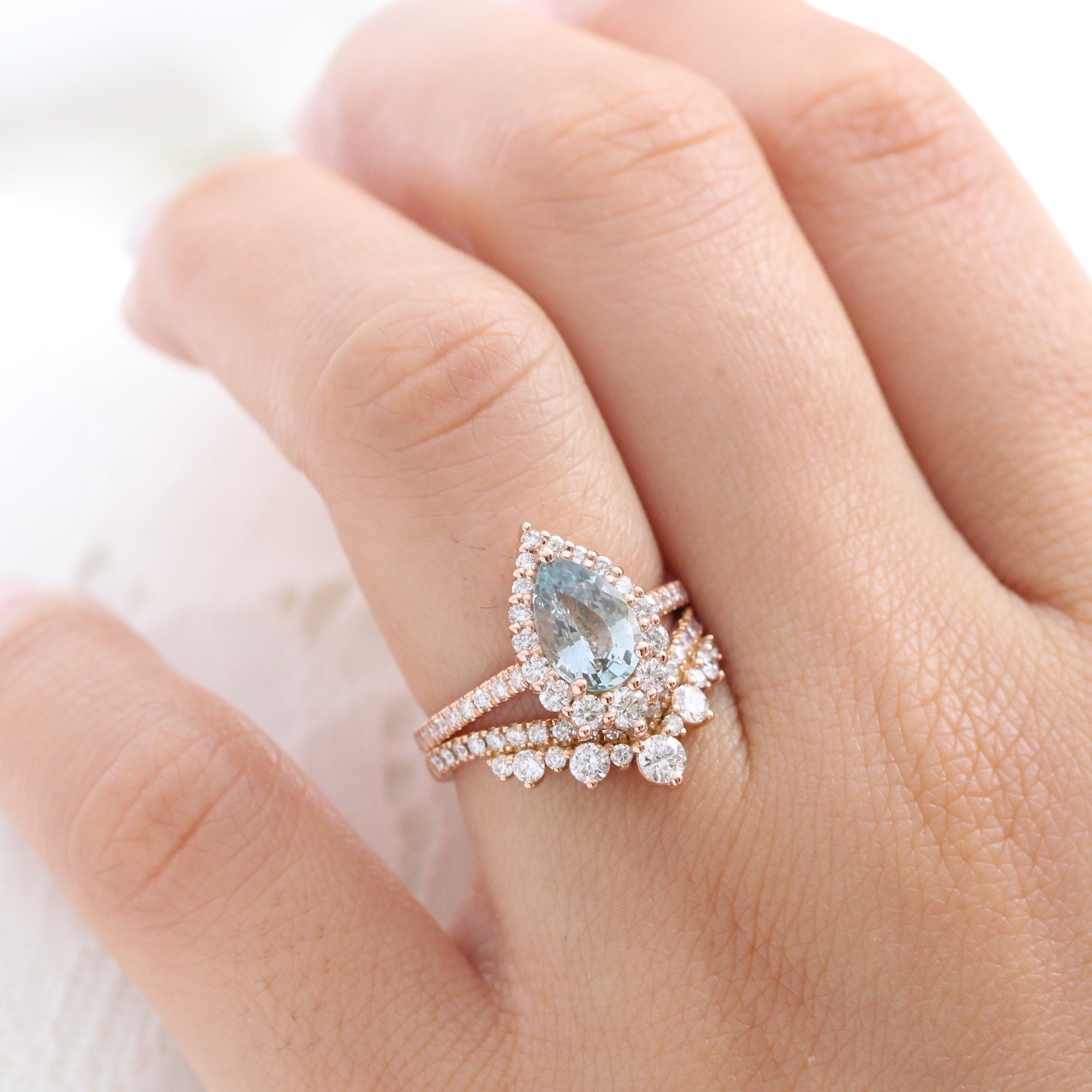 pastel blue sapphire ring rose gold halo diamond pear engagement ring la more design jewelry