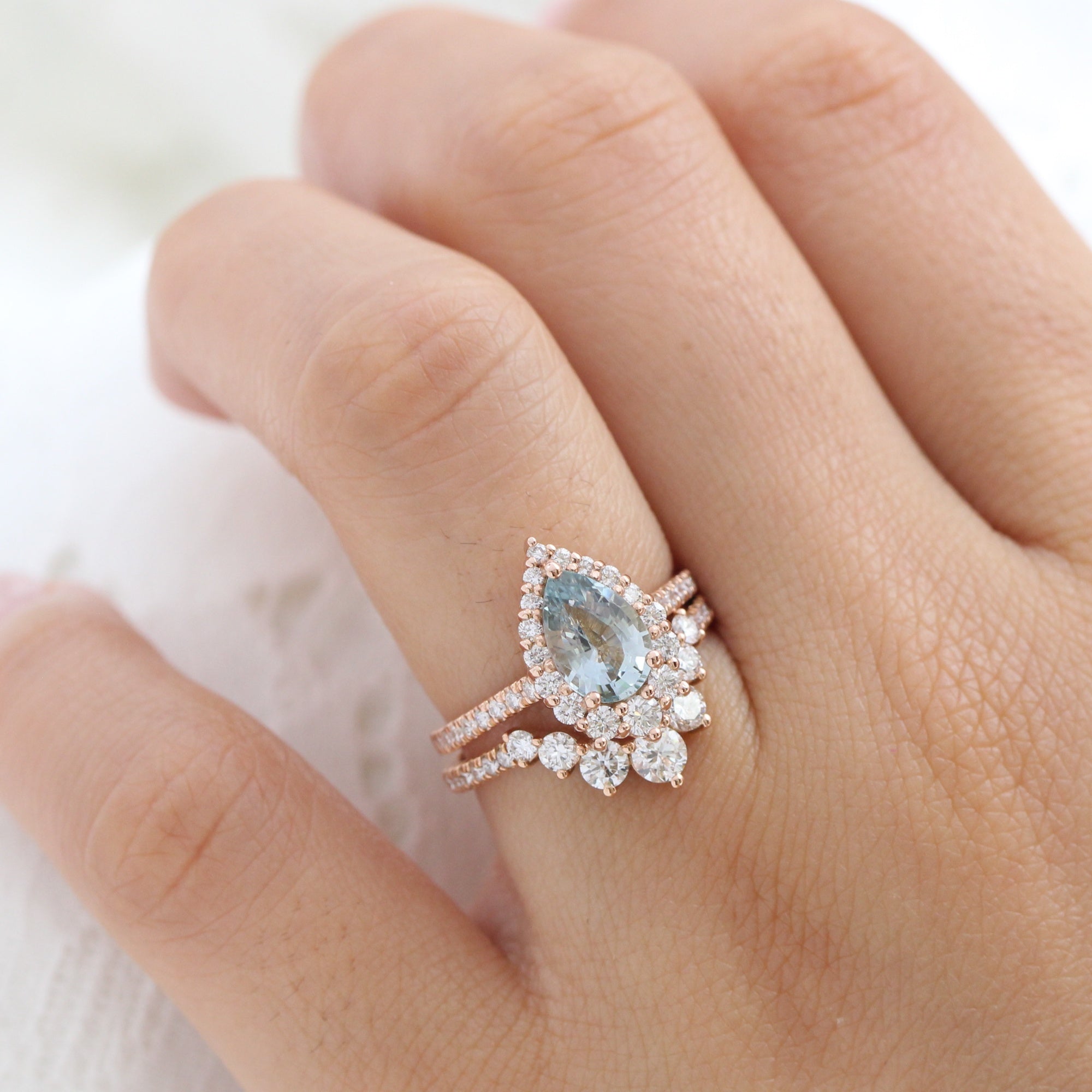 pastel blue sapphire ring rose gold halo diamond pear engagement ring la more design jewelry