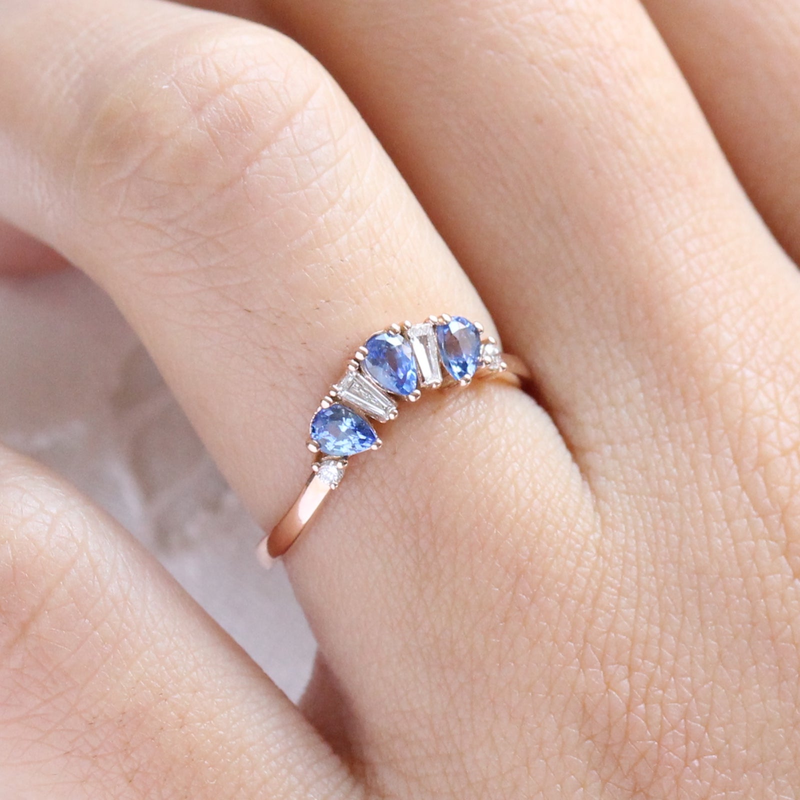 pear and baguette diamond and sapphire ring rose gold curved wedding band by la more design jewelry