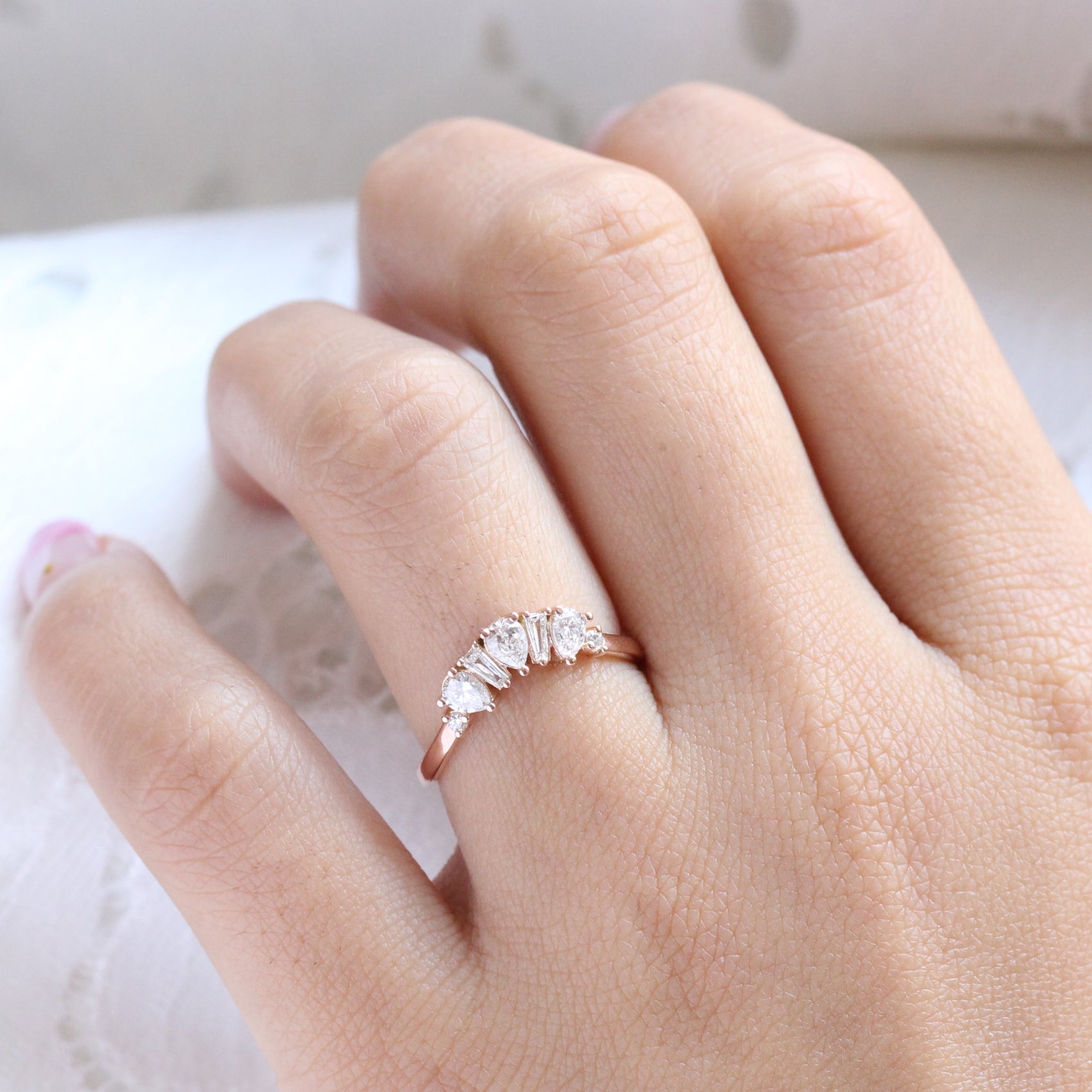 pear and baguette diamond ring rose gold curved wedding band by la more design jewelry