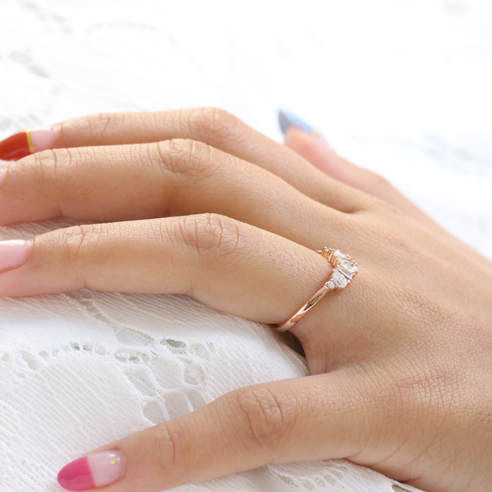 pear and baguette diamond ring rose gold curved wedding band by la more design jewelry