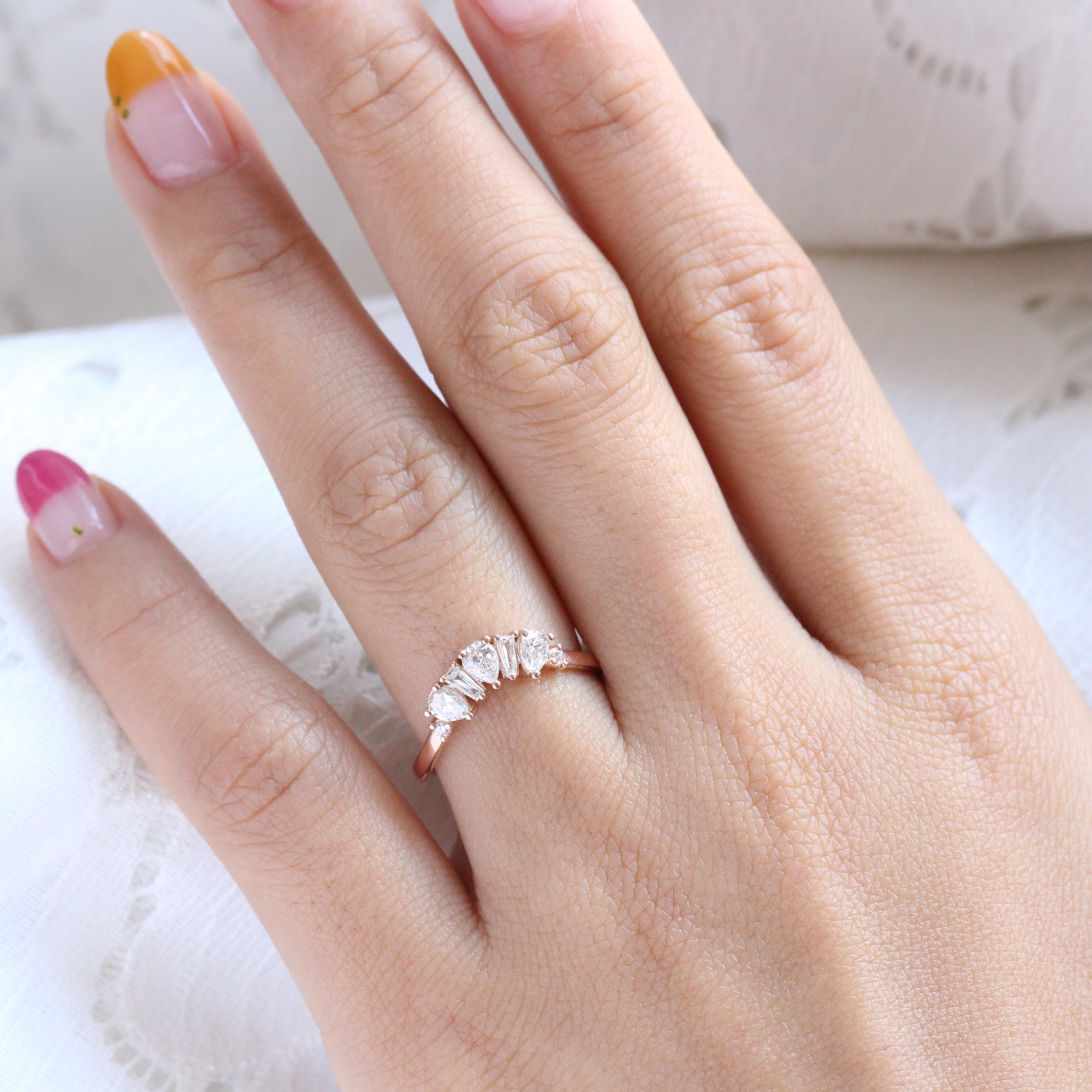 pear and baguette diamond ring rose gold curved wedding band by la more design jewelry