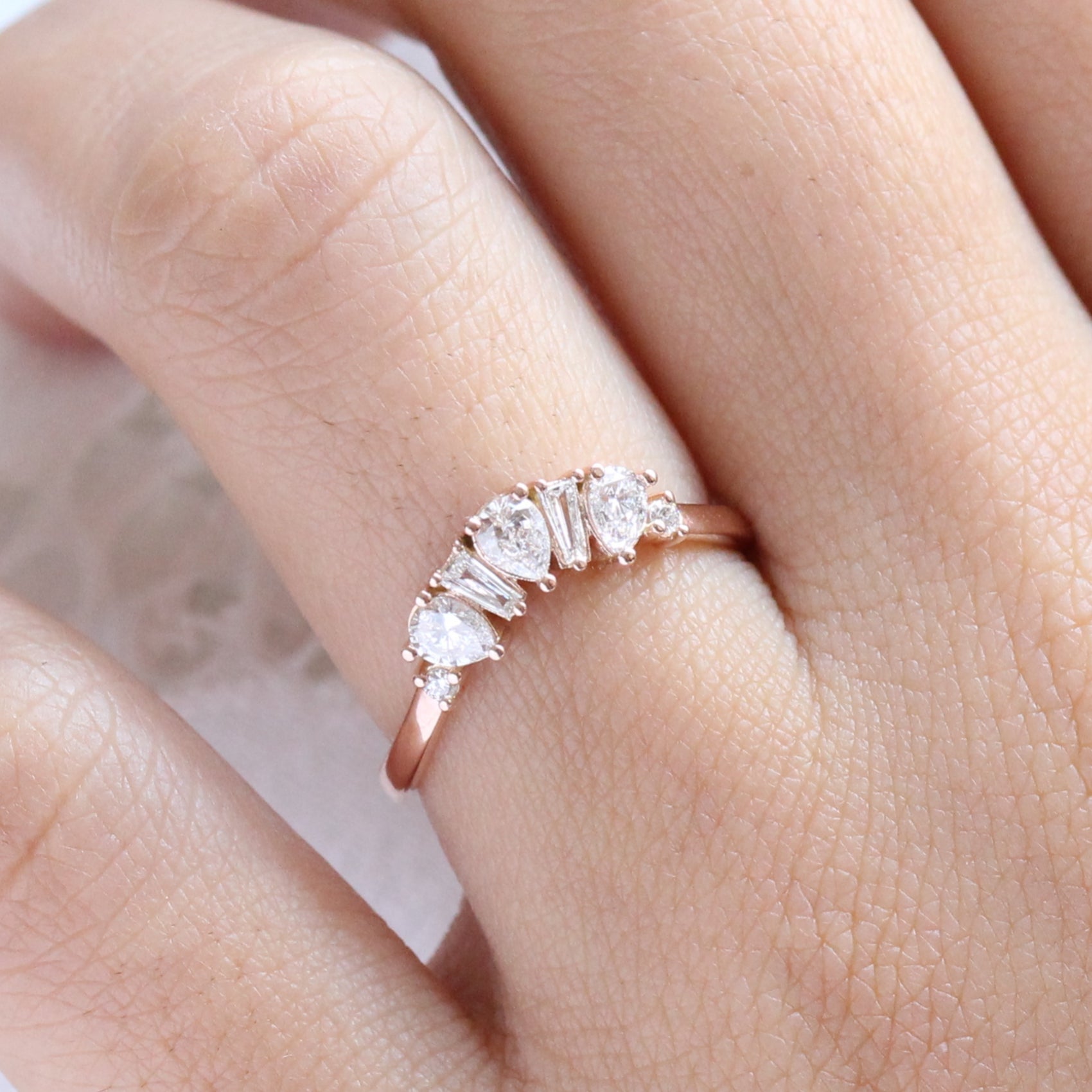 pear and baguette diamond ring rose gold curved wedding band by la more design jewelry