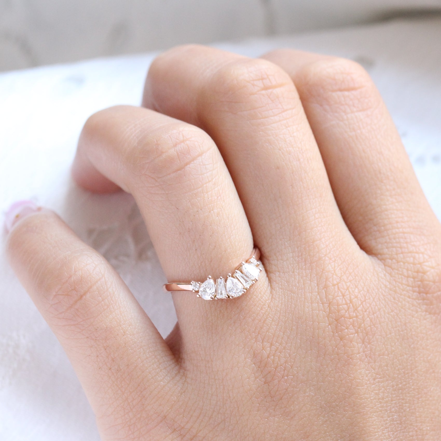 pear and baguette diamond ring rose gold curved wedding band by la more design jewelry