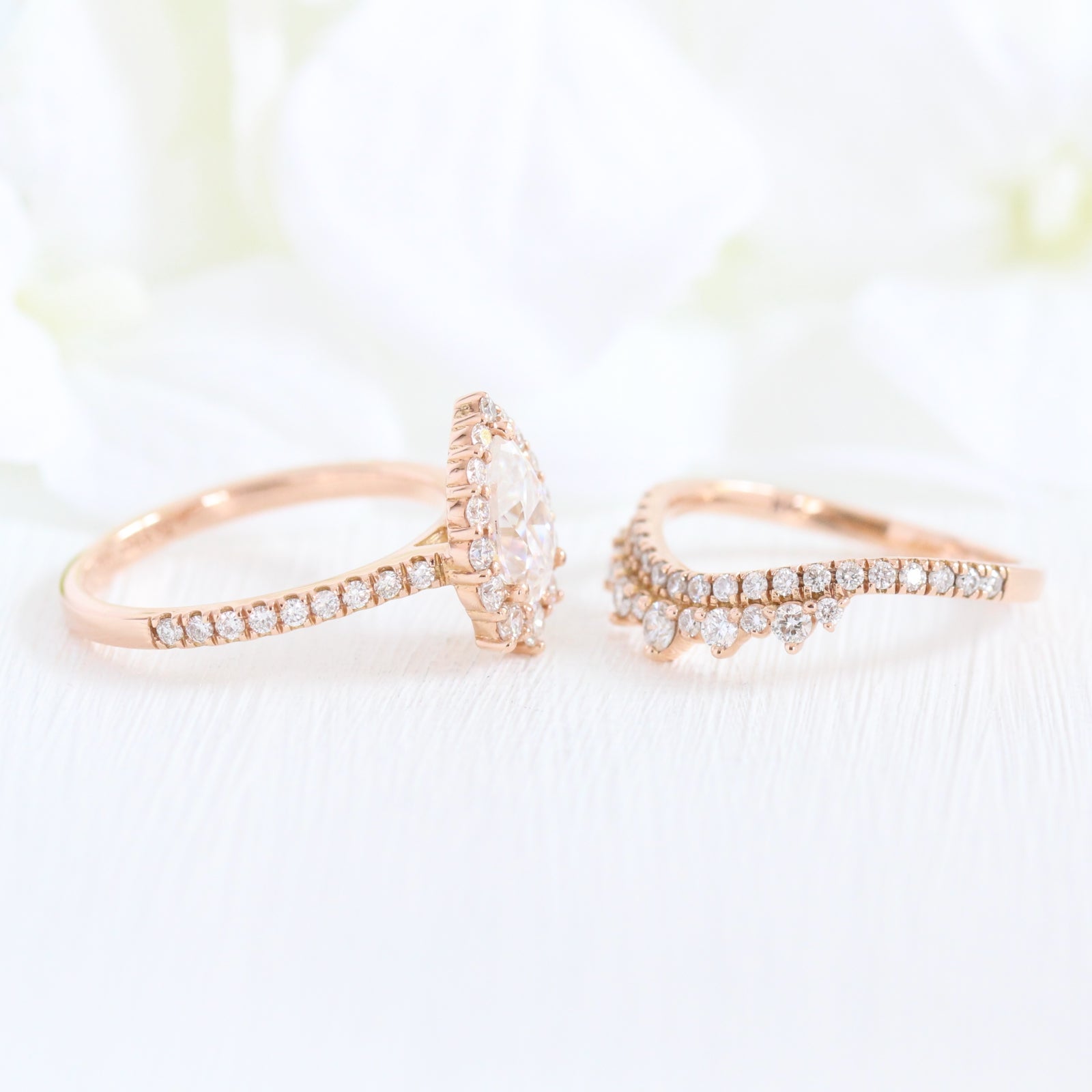 pear moissanite engagement ring rose gold and curved crown diamond wedding band by la more design jewelry