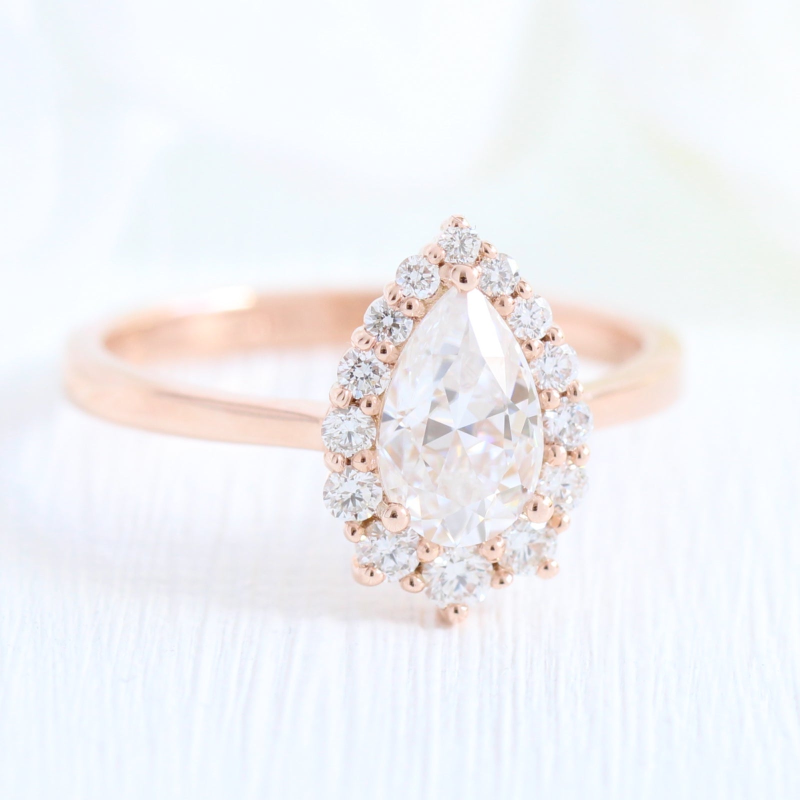pear moissanite engagement ring rose gold halo diamond ring low profile ring by la more design jewelry 