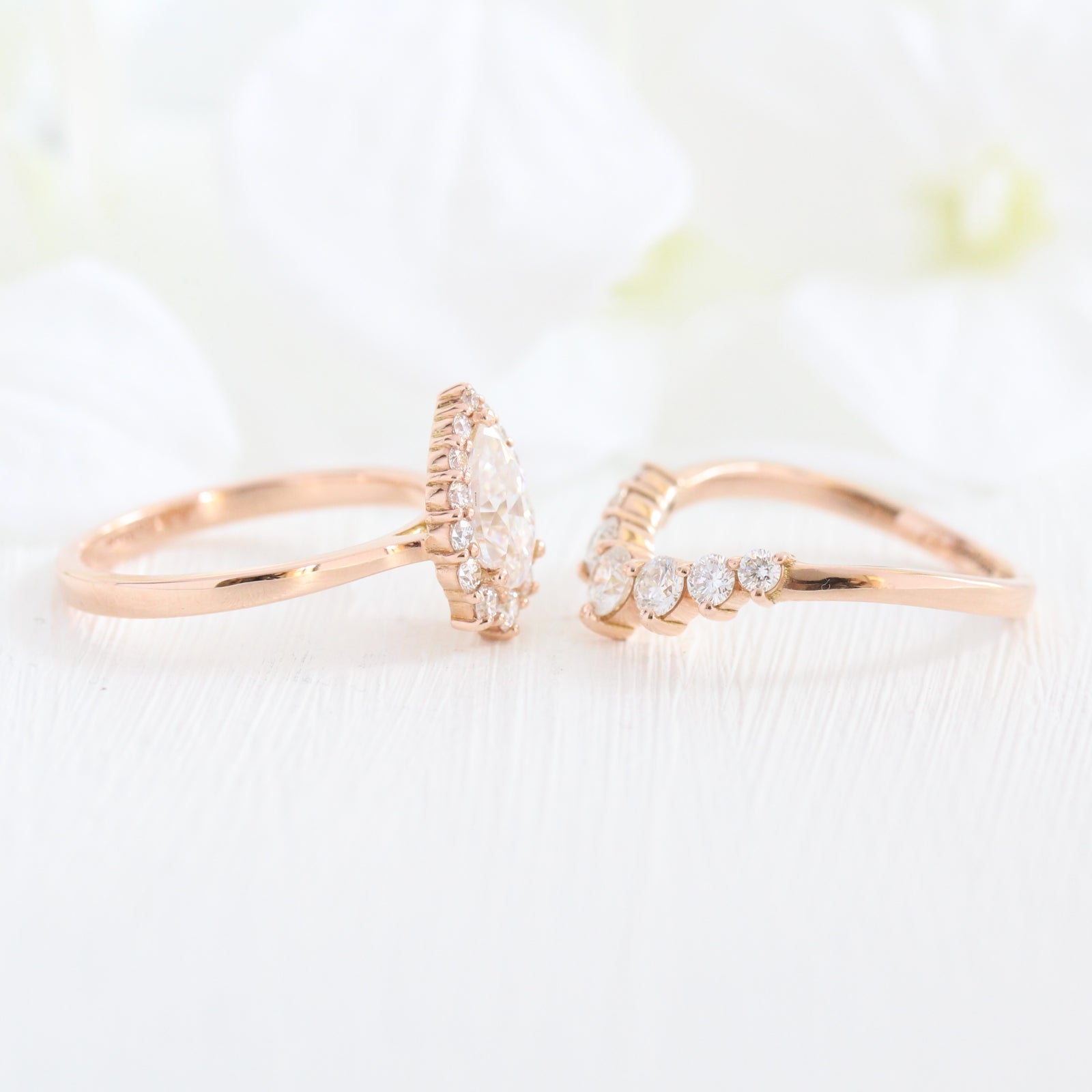 pear moissanite halo diamond engagement ring rose gold and large diamond wedding band by la more design jewelry