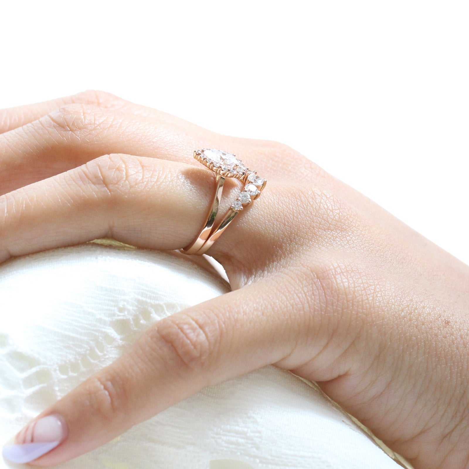 pear moissanite halo diamond engagement ring rose gold and large diamond wedding band by la more design jewelry