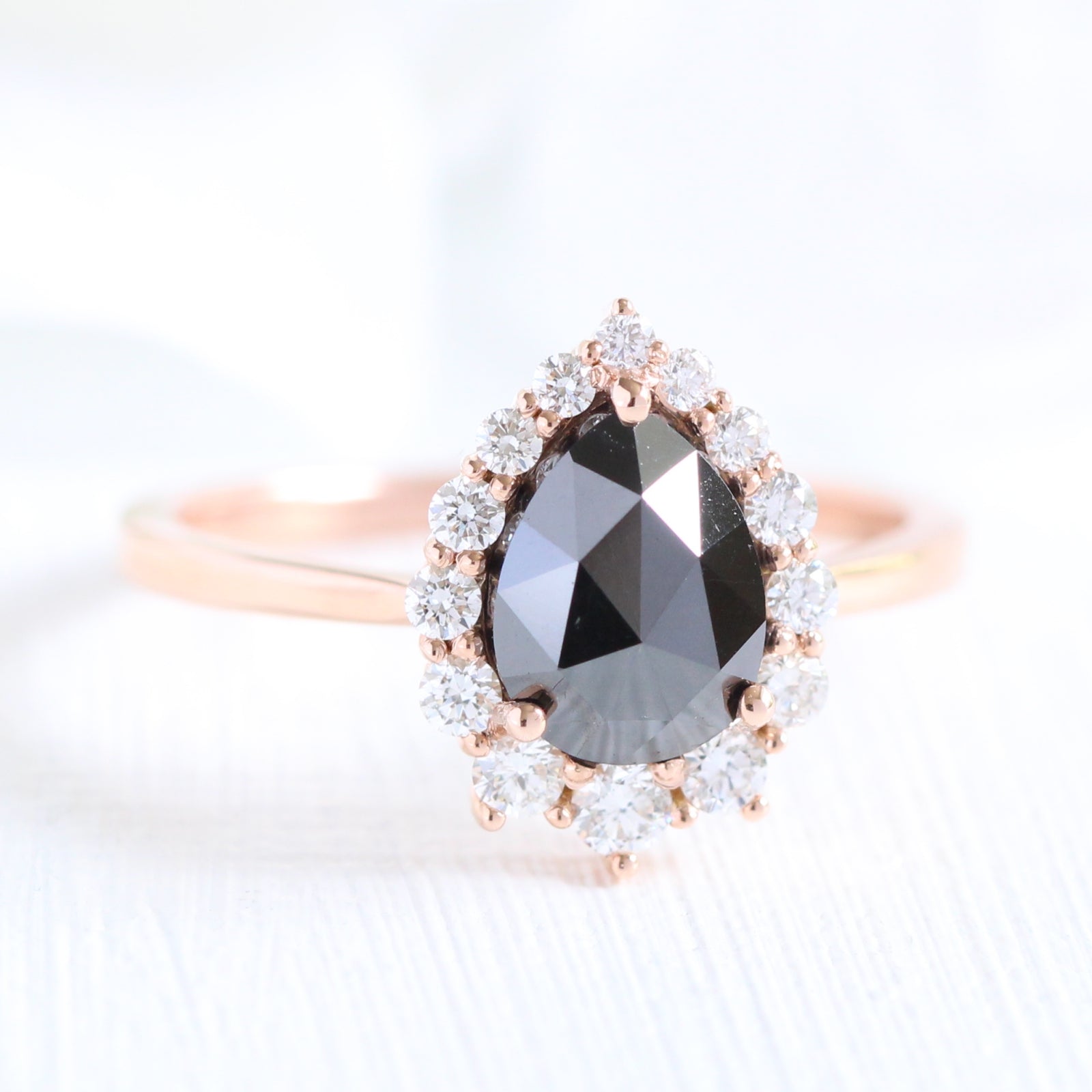 pear rose cut black diamond engagement ring in rose gold halo diamond by la more design