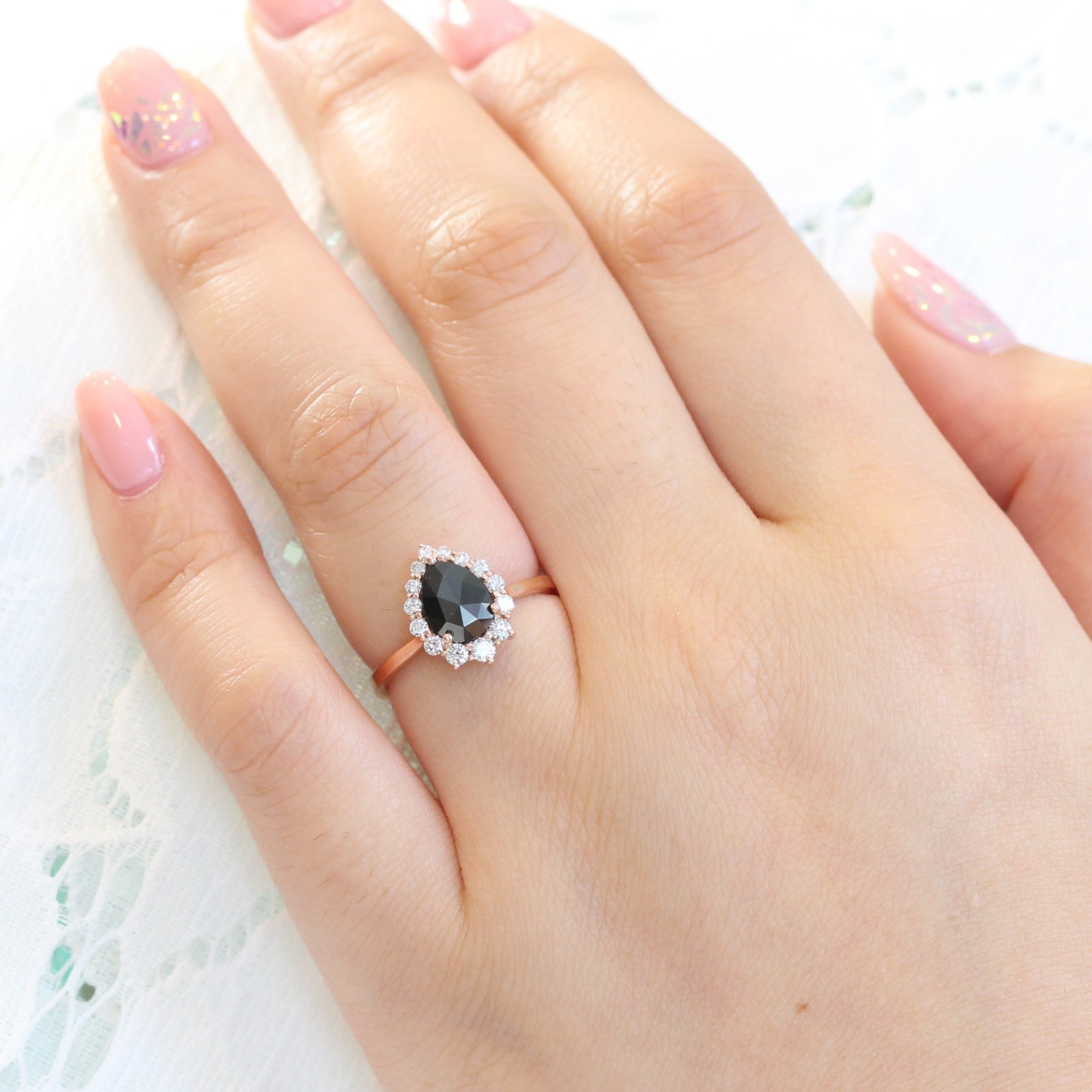 pear rose cut black diamond engagement ring in rose gold halo diamond by la more design