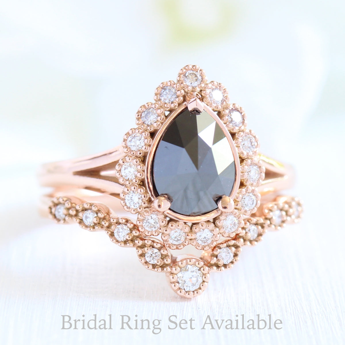 pear rose cut black diamond ring rose gold and curved diamond wedding ring set by la more design