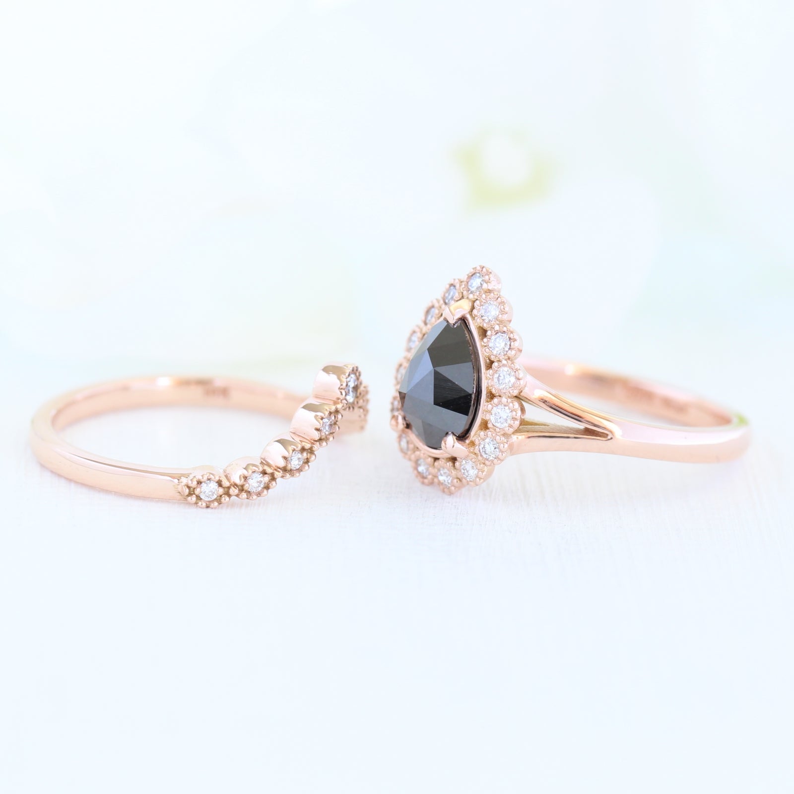 pear rose cut black diamond ring rose gold and curved diamond wedding ring set by la more design
