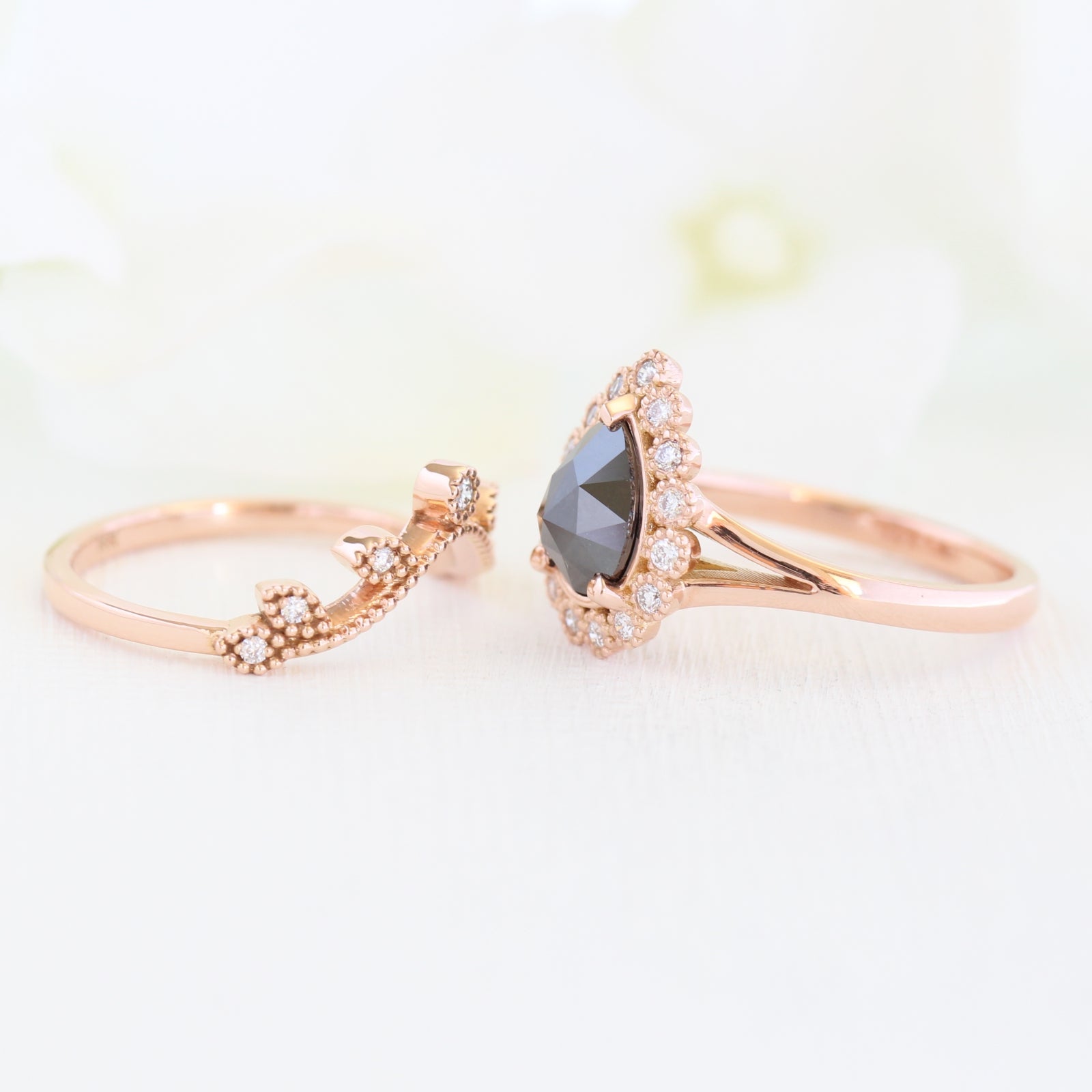 pear rose cut black diamond ring rose gold and curved leaf diamond wedding ring set by la more design