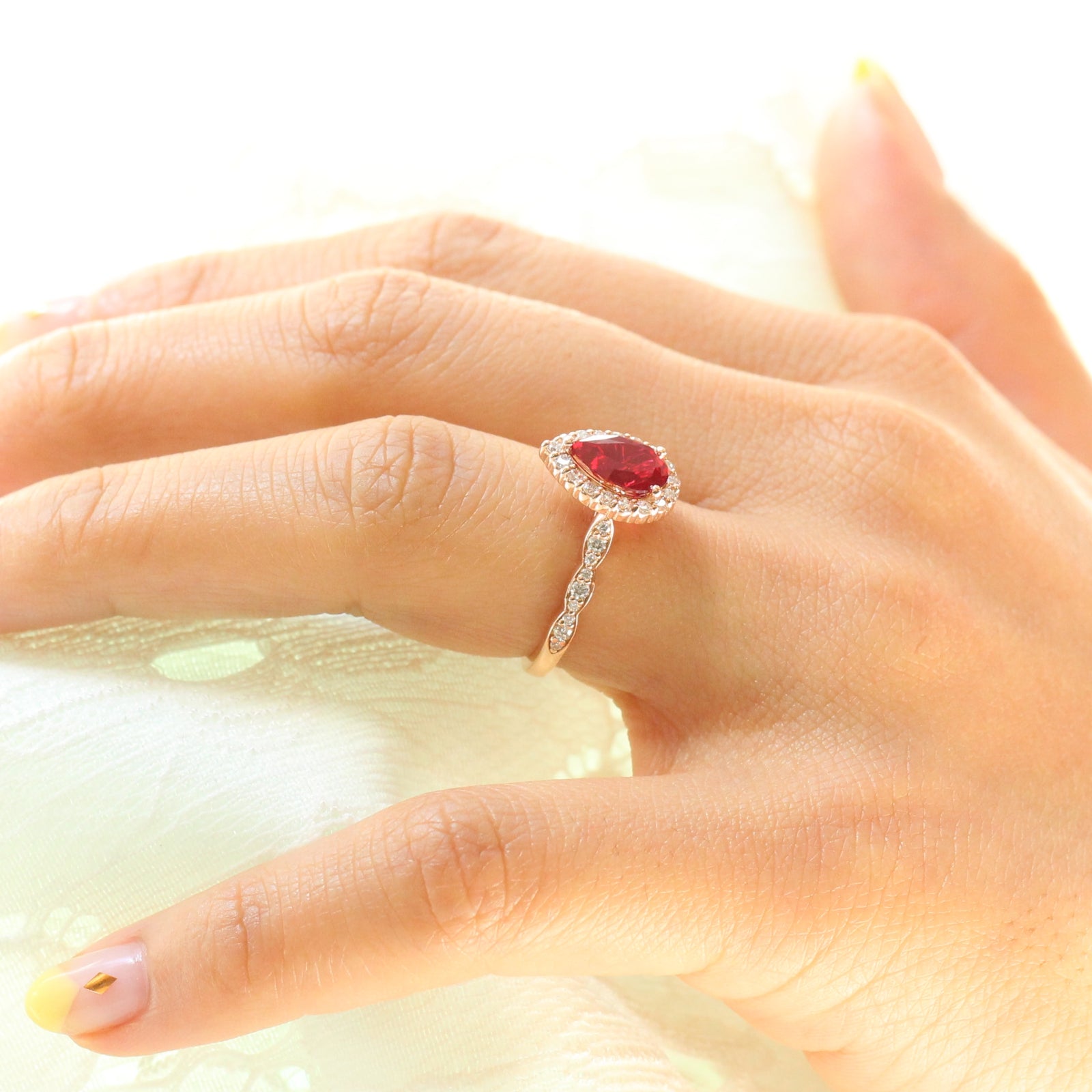 pear ruby engagement ring rose gold halo diamond ring by la more design jewelry