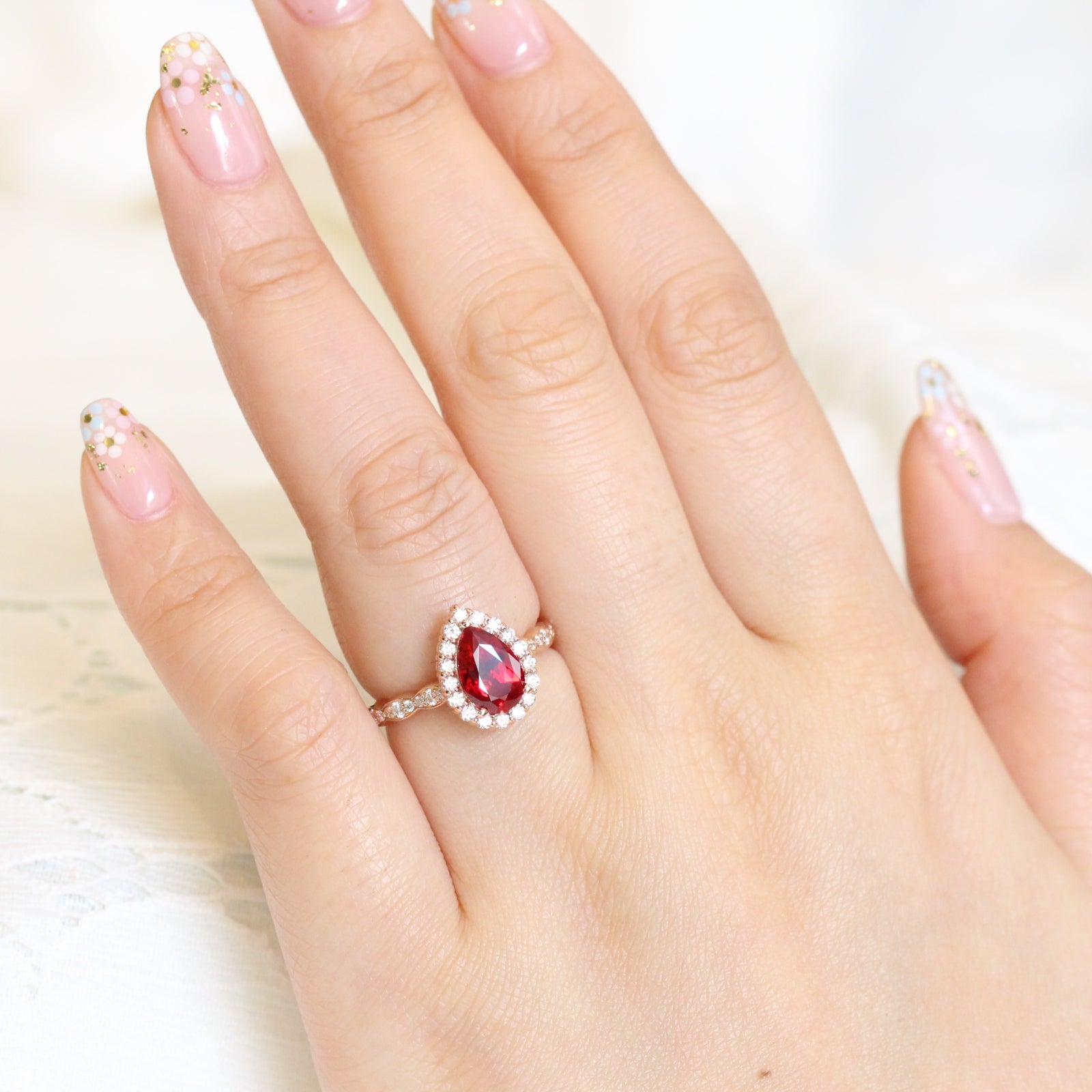 pear ruby engagement ring rose gold halo diamond ring by la more design jewelry