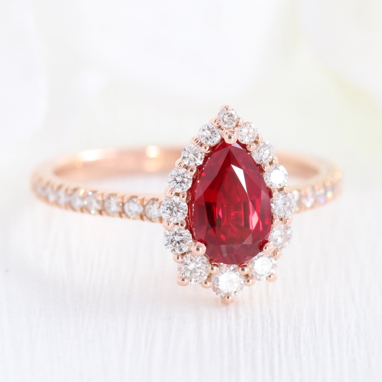 pear shaped ruby engagement ring rose gold halo diamond ring low profile ring by la more design jewelry