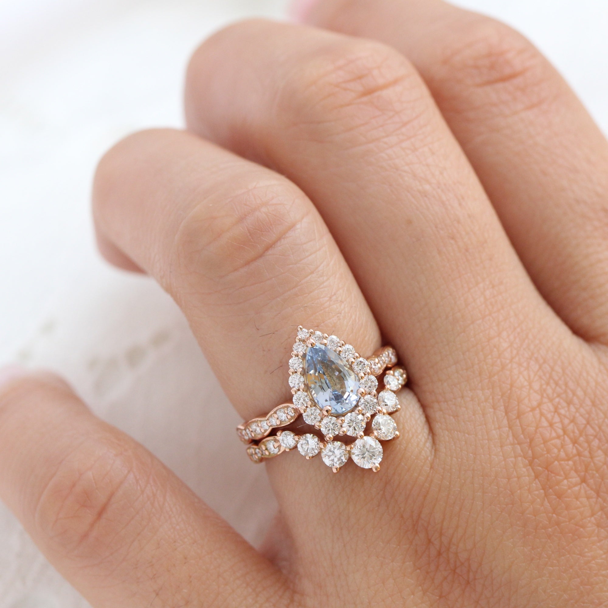 pear aqua blue sapphire ring rose gold halo diamond ring scalloped diamond band la more design jewelry