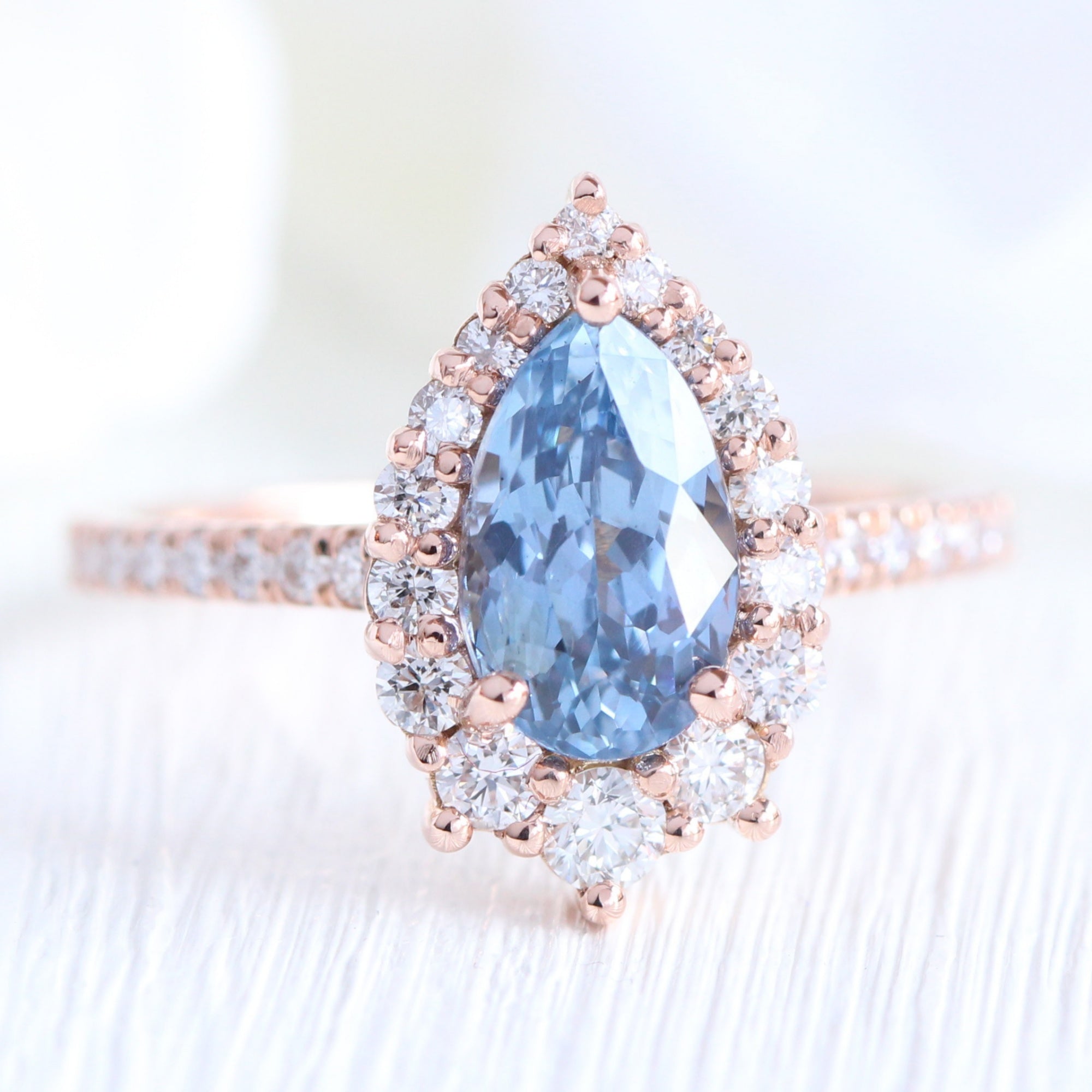 pear blue sapphire ring rose gold halo diamond ring pave diamond band la more design jewelry
