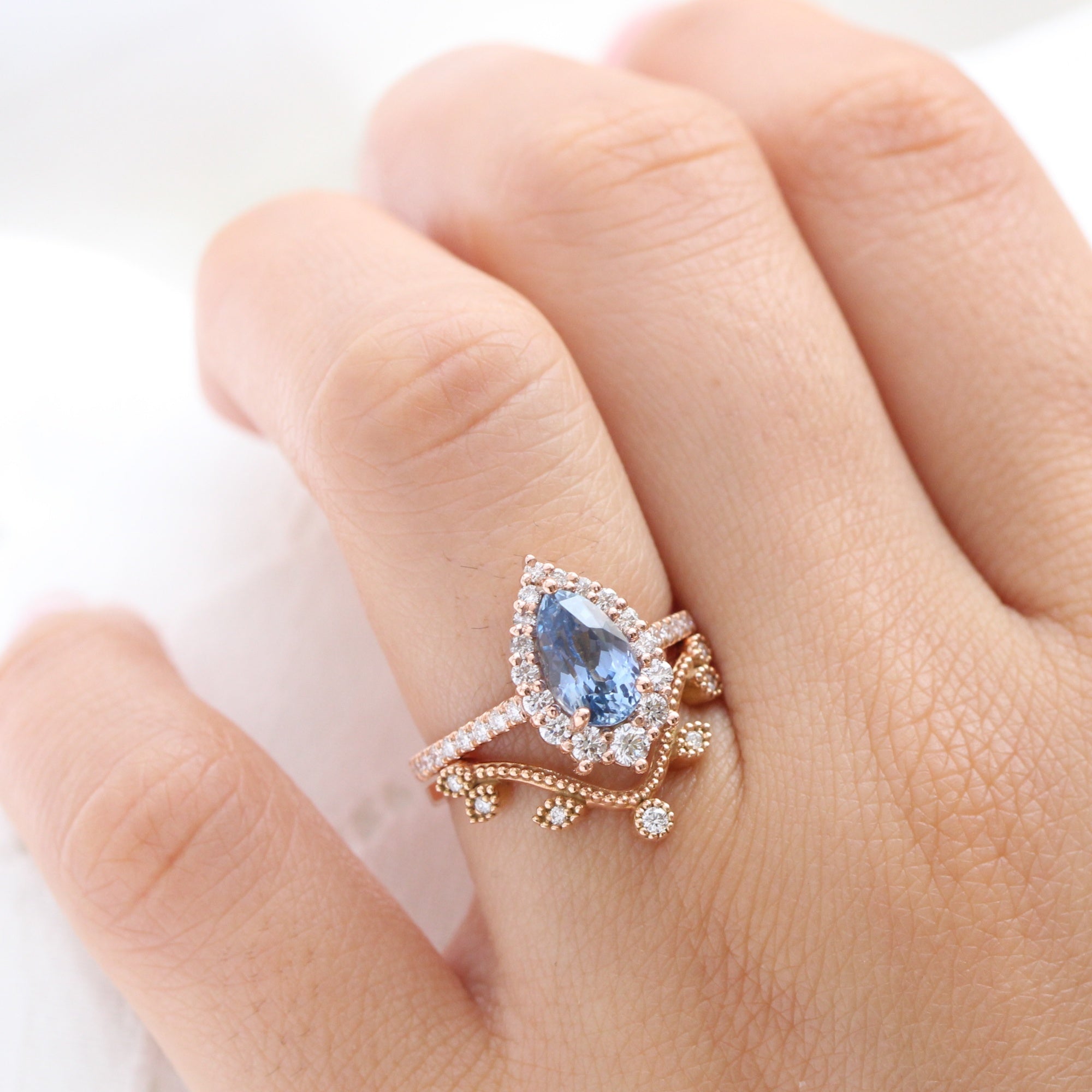 pear blue sapphire ring rose gold halo diamond ring pave diamond band la more design jewelry