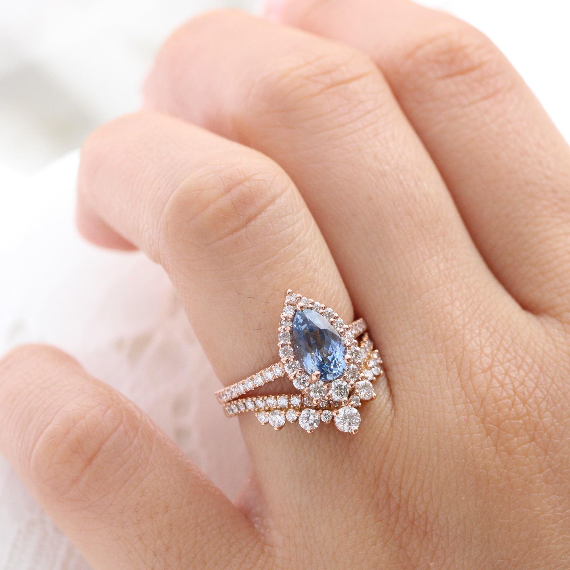 pear blue sapphire ring rose gold halo diamond ring pave diamond band la more design jewelry