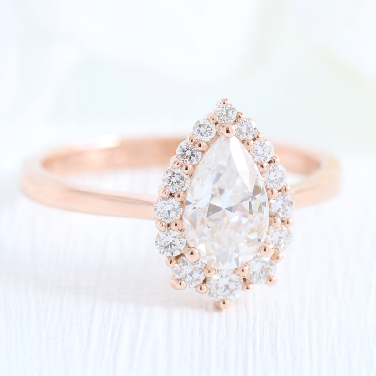 pear moissanite engagement ring rose gold halo diamond ring low profile ring by la more design jewelry 