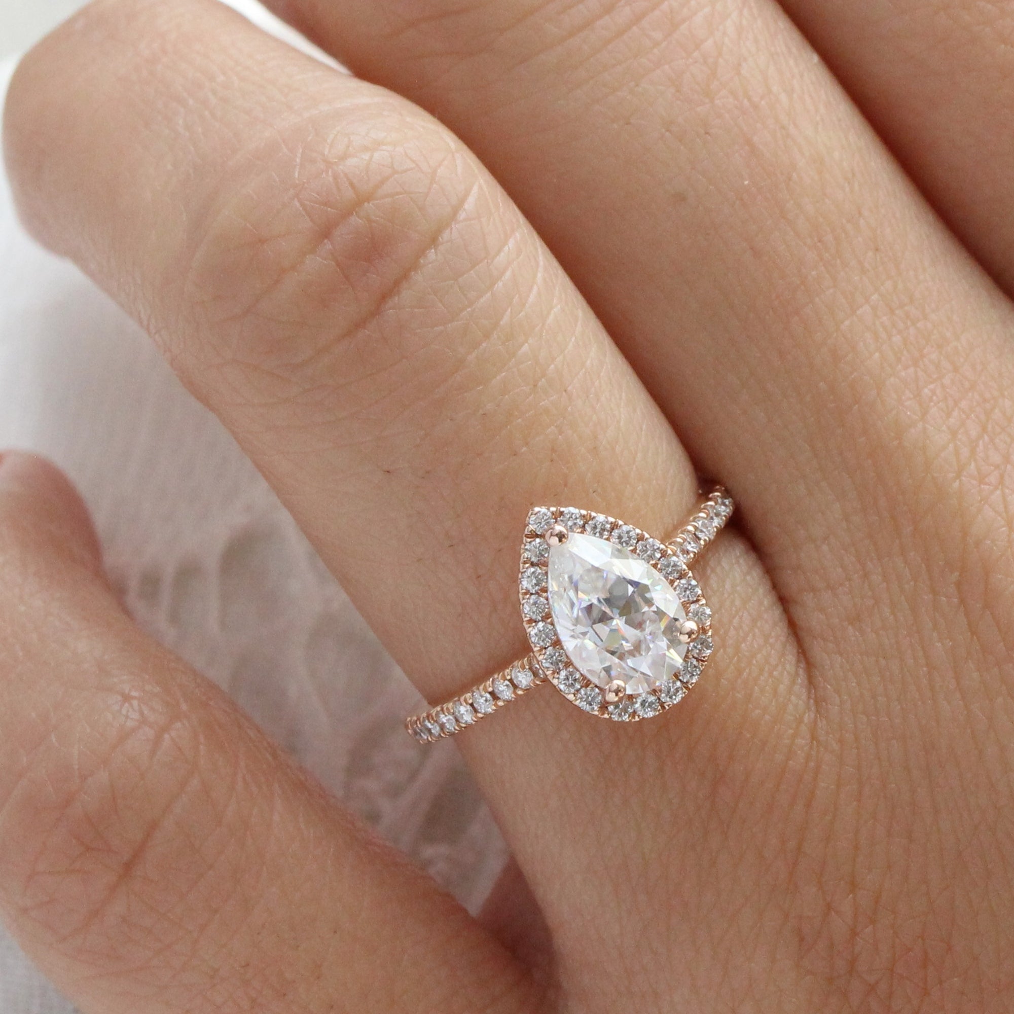 pear moissanite ring rose gold halo engagement ring la more design jewelry