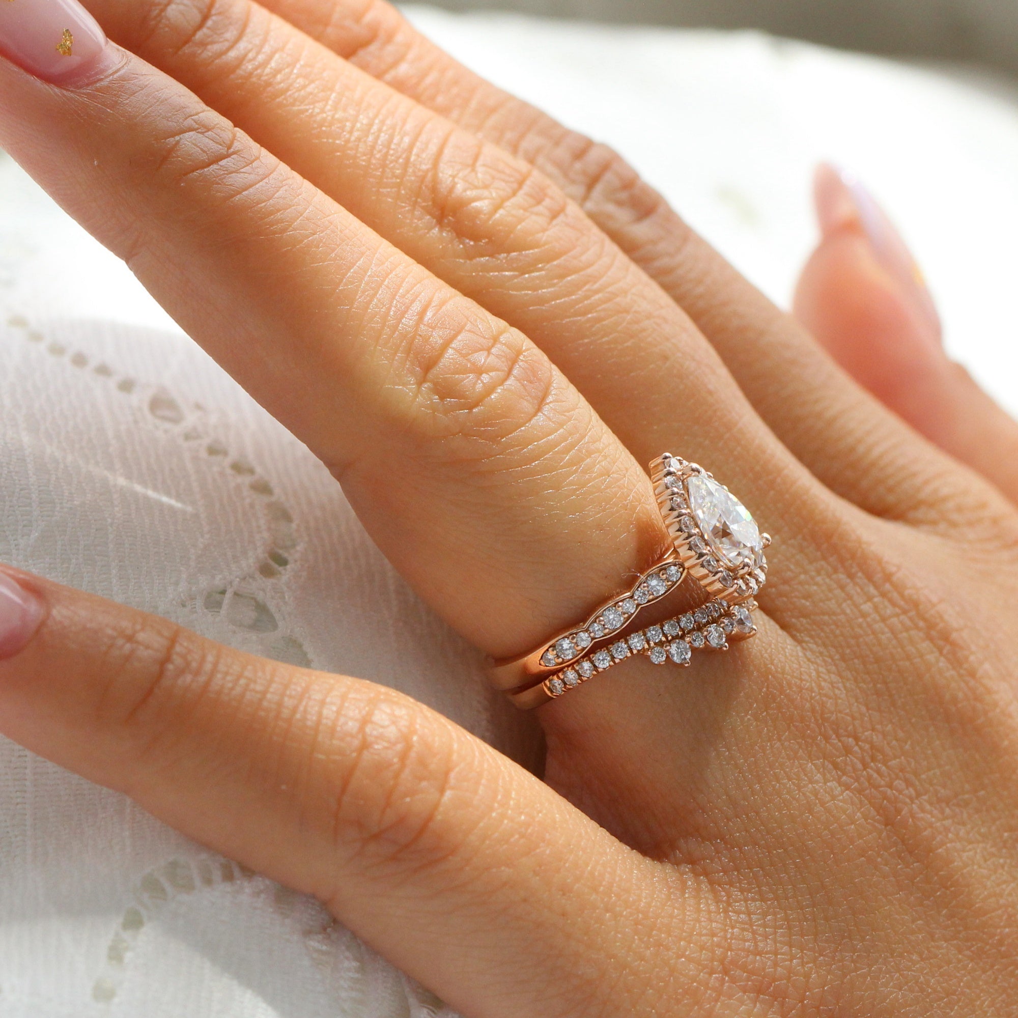 pear moissanite ring stack rose gold crown diamond wedding band bridal set la more design jewelry