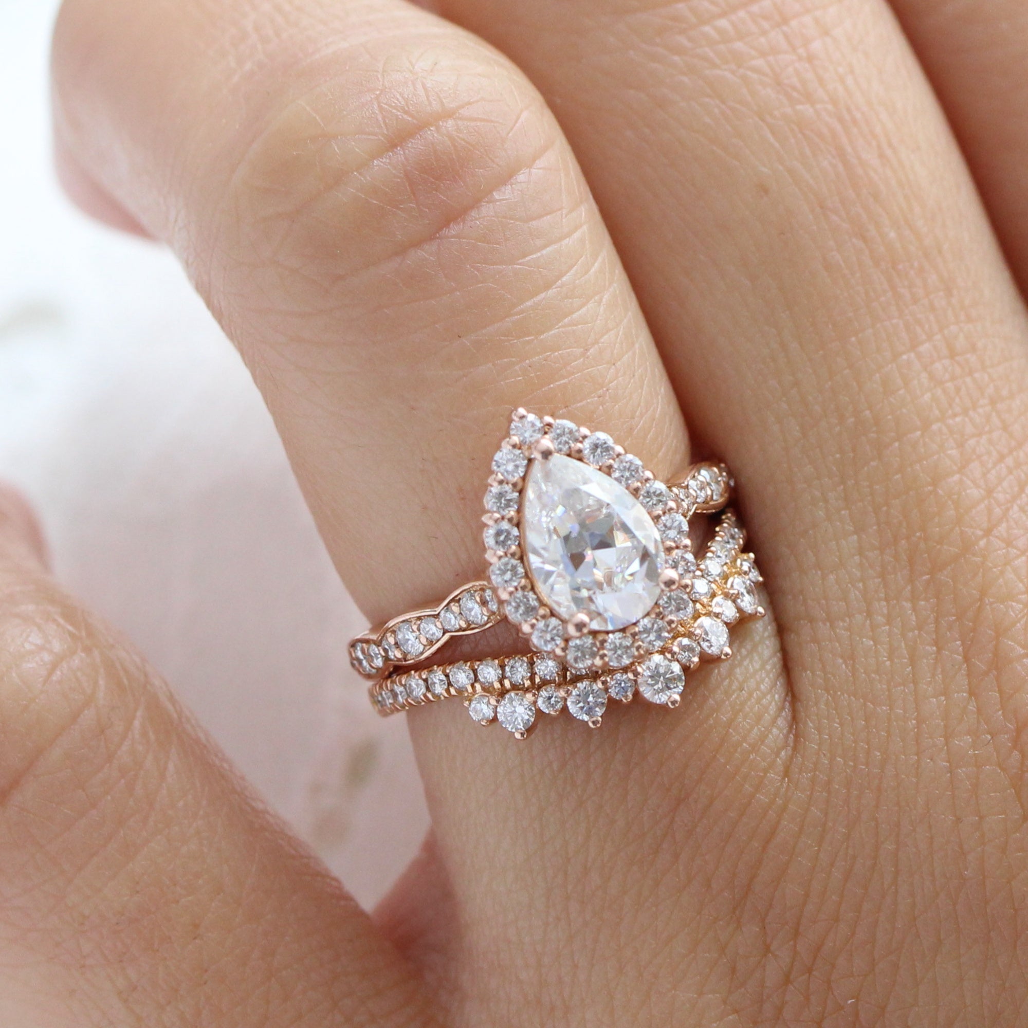 pear moissanite ring stack rose gold crown diamond wedding band bridal set la more design jewelry