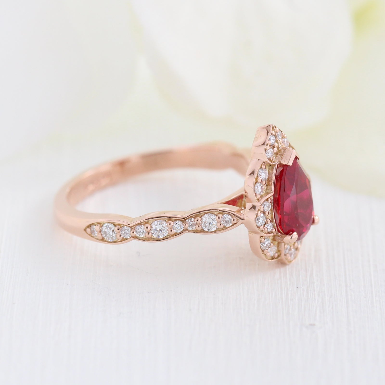 vintage halo diamond pear ruby ring stack rose gold curved diamond wedding band la more design jewelry