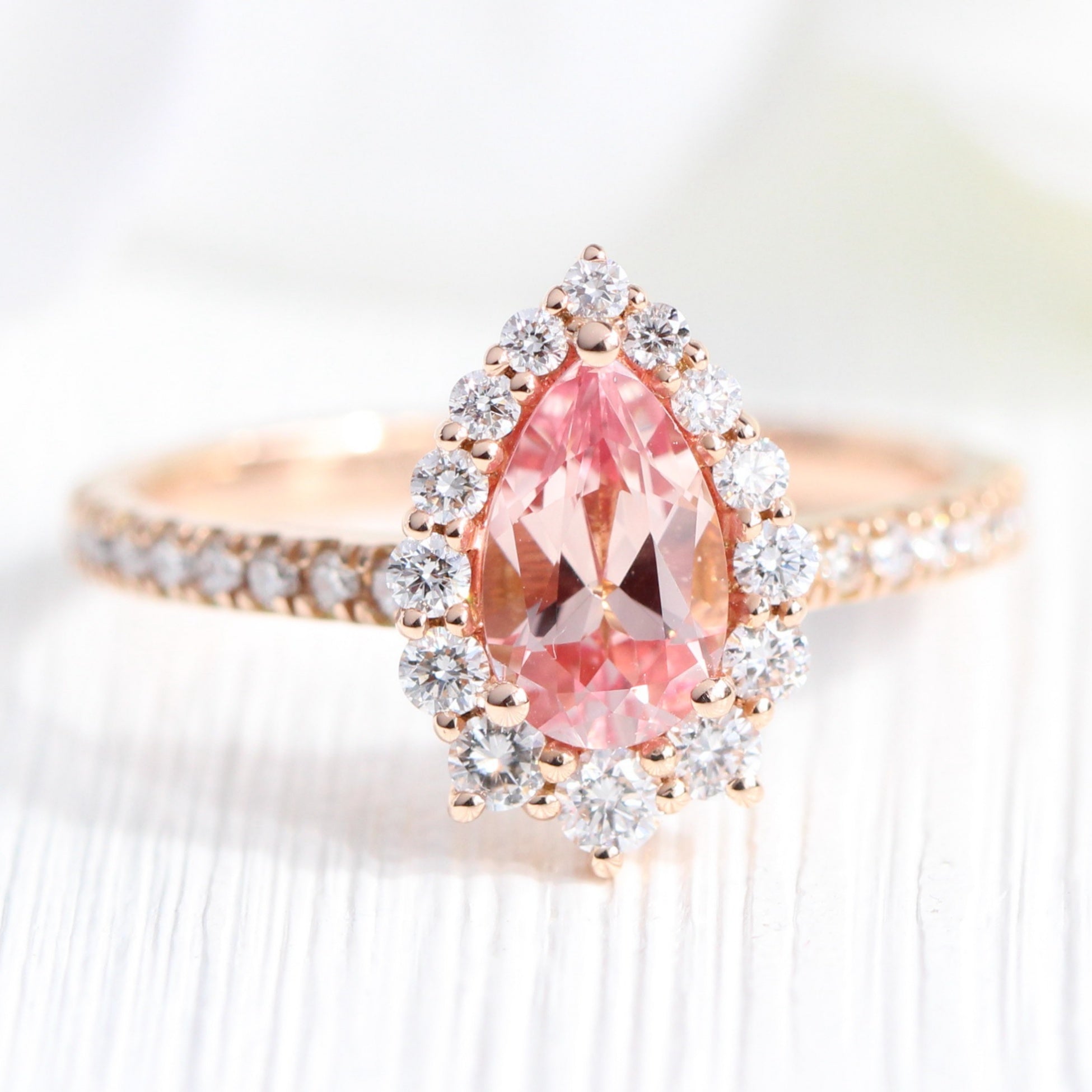 pear shaped peach sapphire engagement ring rose gold halo diamond ring by la more design jewelry