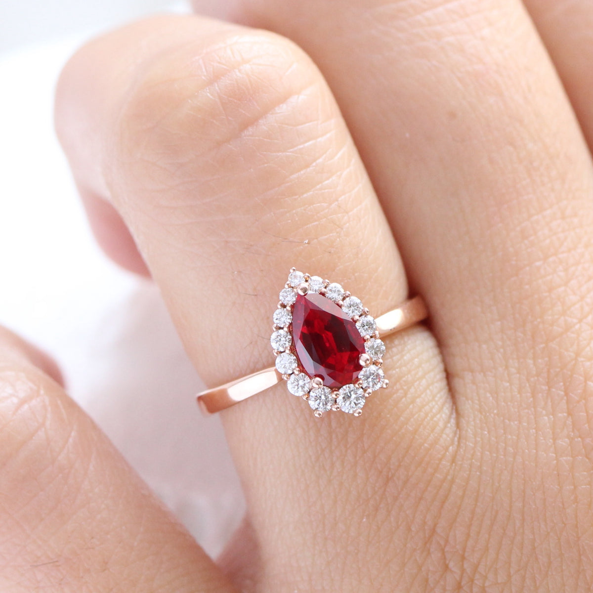 pear shaped ruby engagement ring rose gold halo diamond cluster ring la more design jewelry