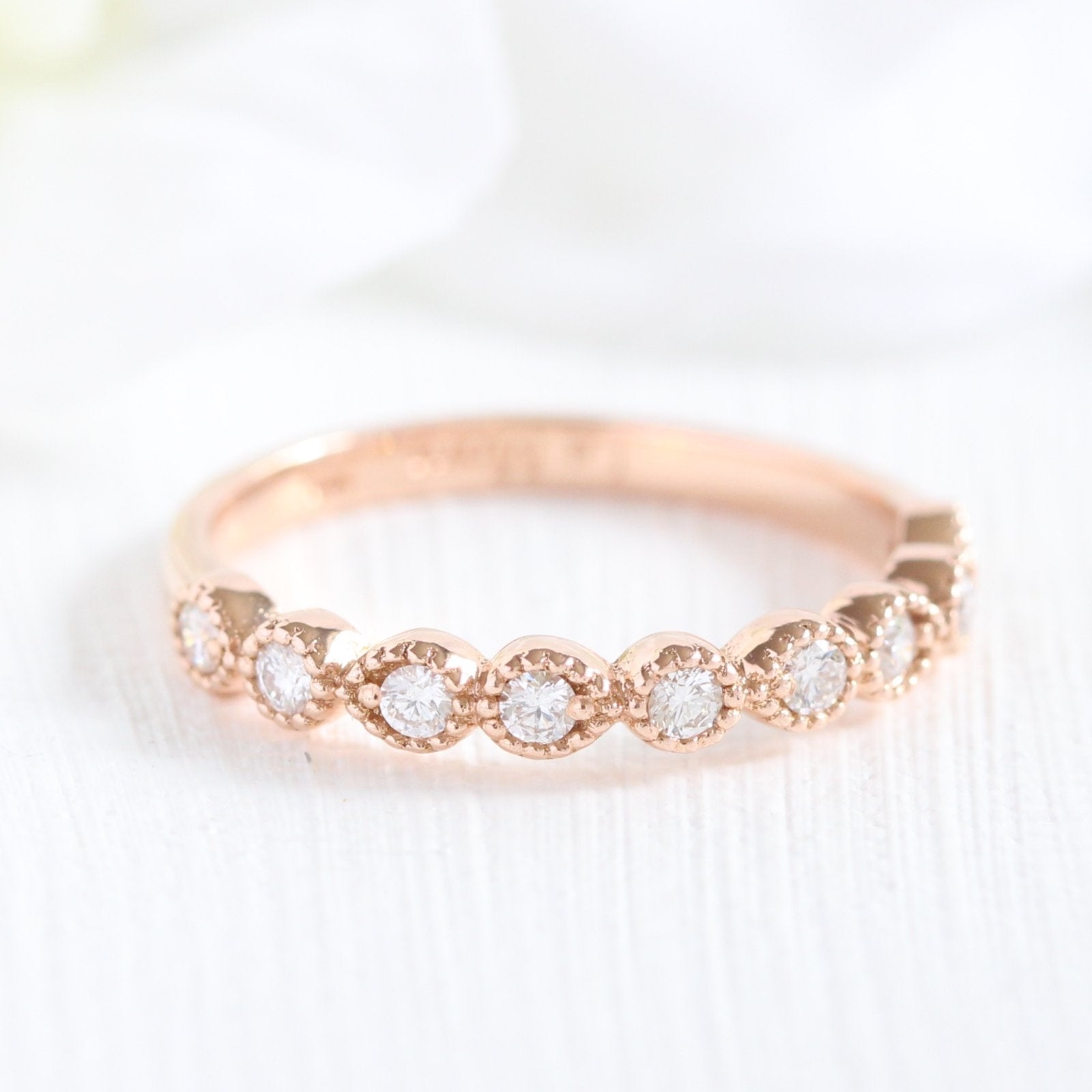 half eternity diamond wedding ring in rose gold milgrain band by la more design
