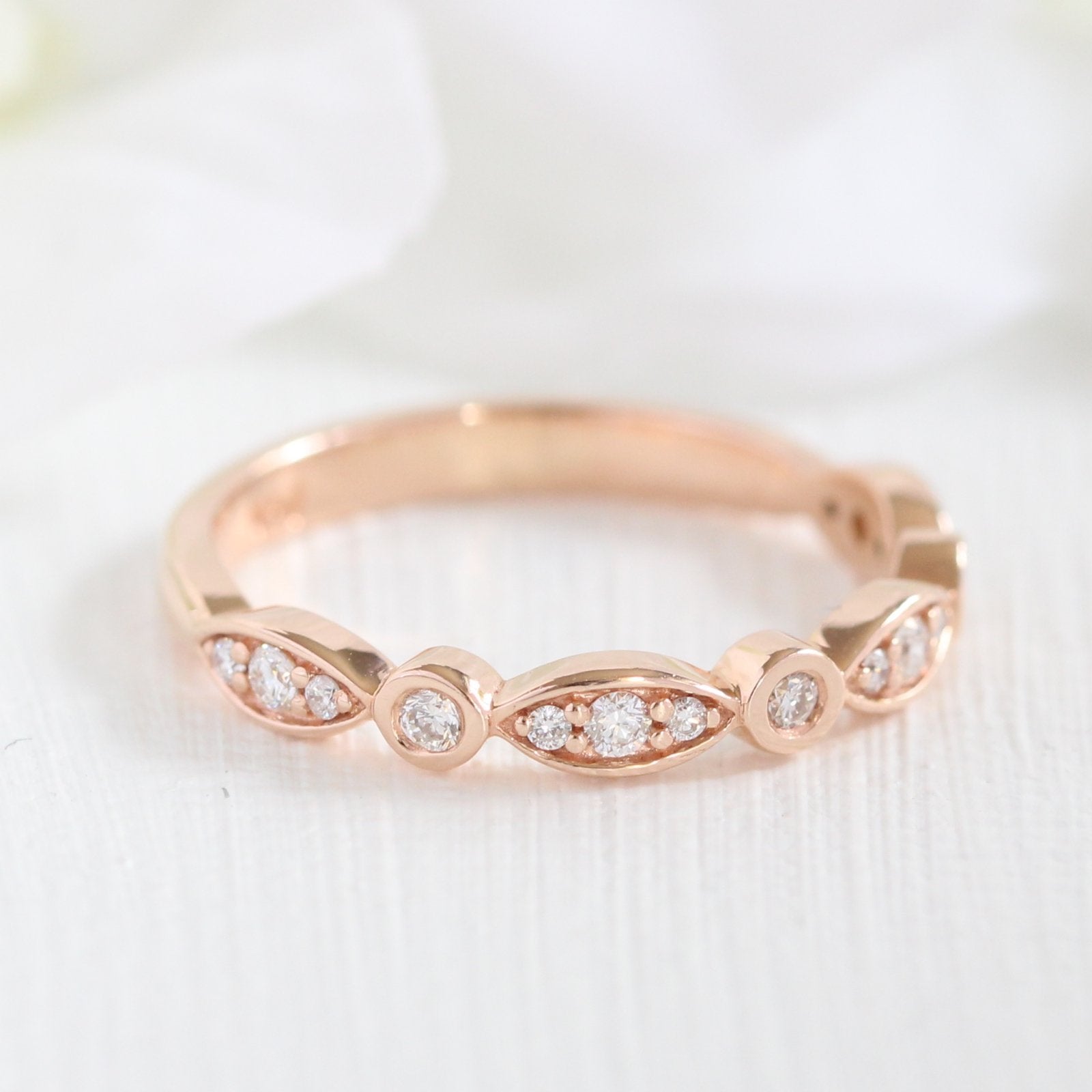 rose gold bezel diamond wedding band by la more design jewelry