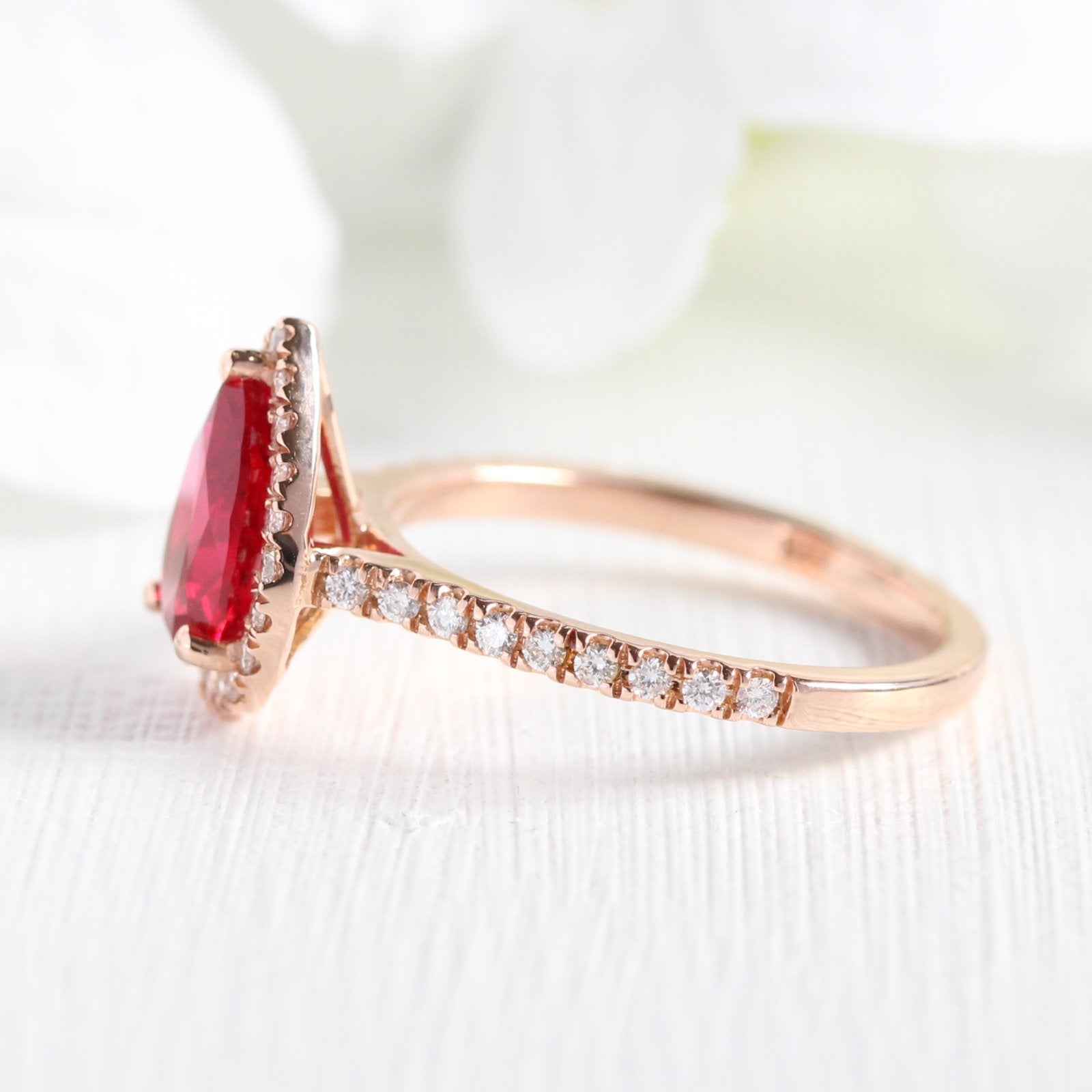 rose gold halo diamond ruby engagement ring by la more design