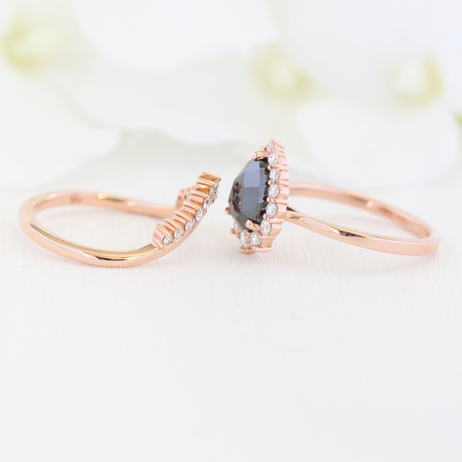 rose gold pear rose cut black diamond ring and v shaped diamond wedding ring set by la more design
