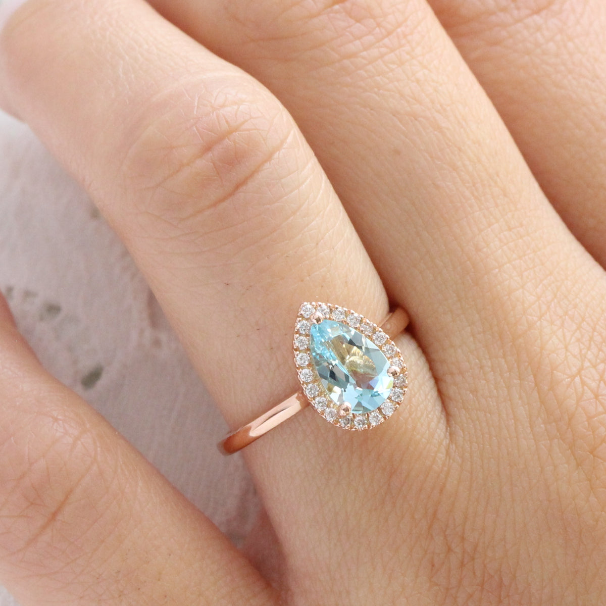 rose gold pear aquamarine halo diamond engagement ring by la more design jewelry