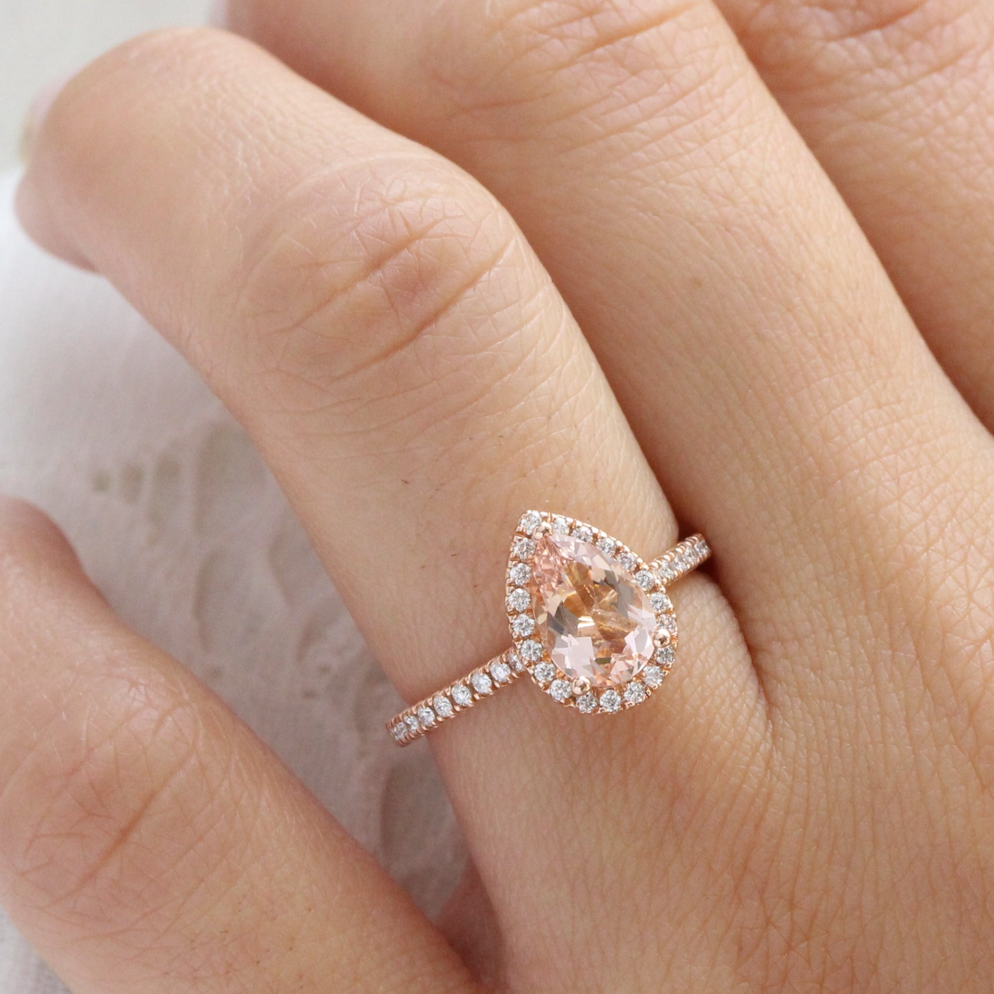 rose gold pear morganite halo diamond engagement ring by la more design