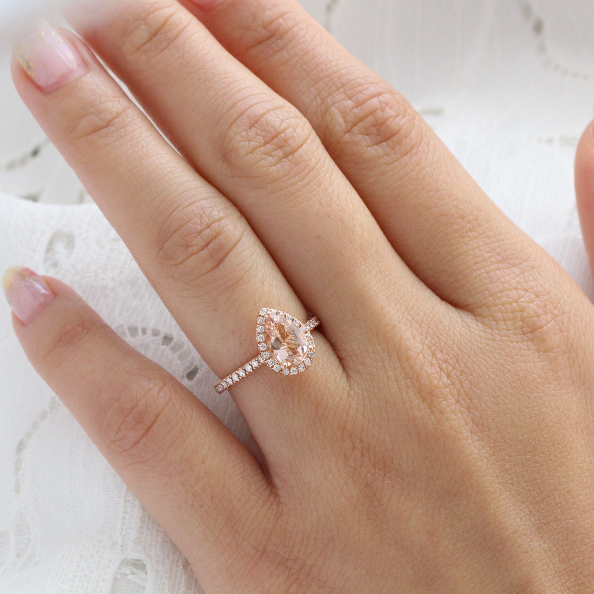 rose gold pear morganite halo diamond engagement ring by la more design