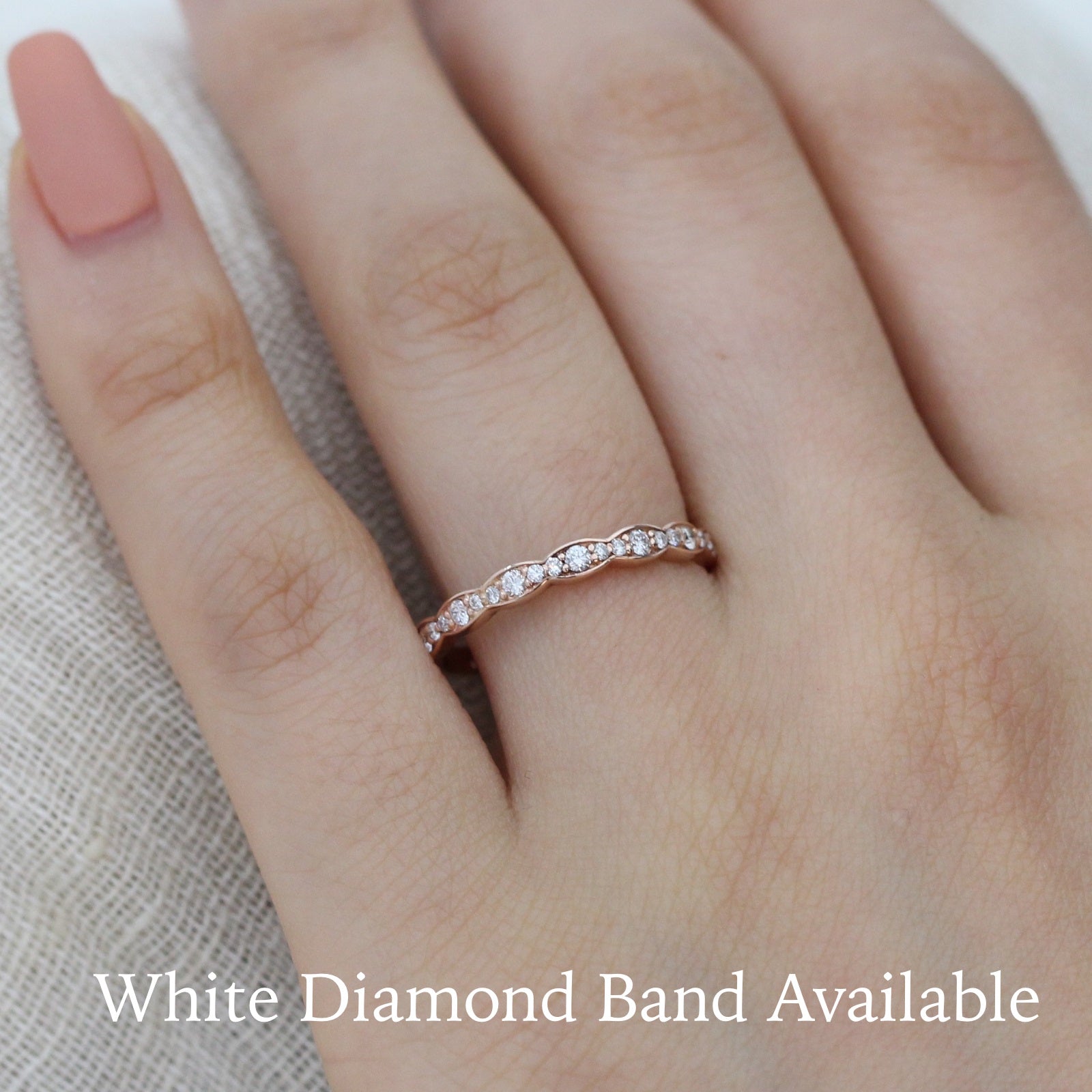 White diamond wedding ring in rose gold scalloped band by la more design