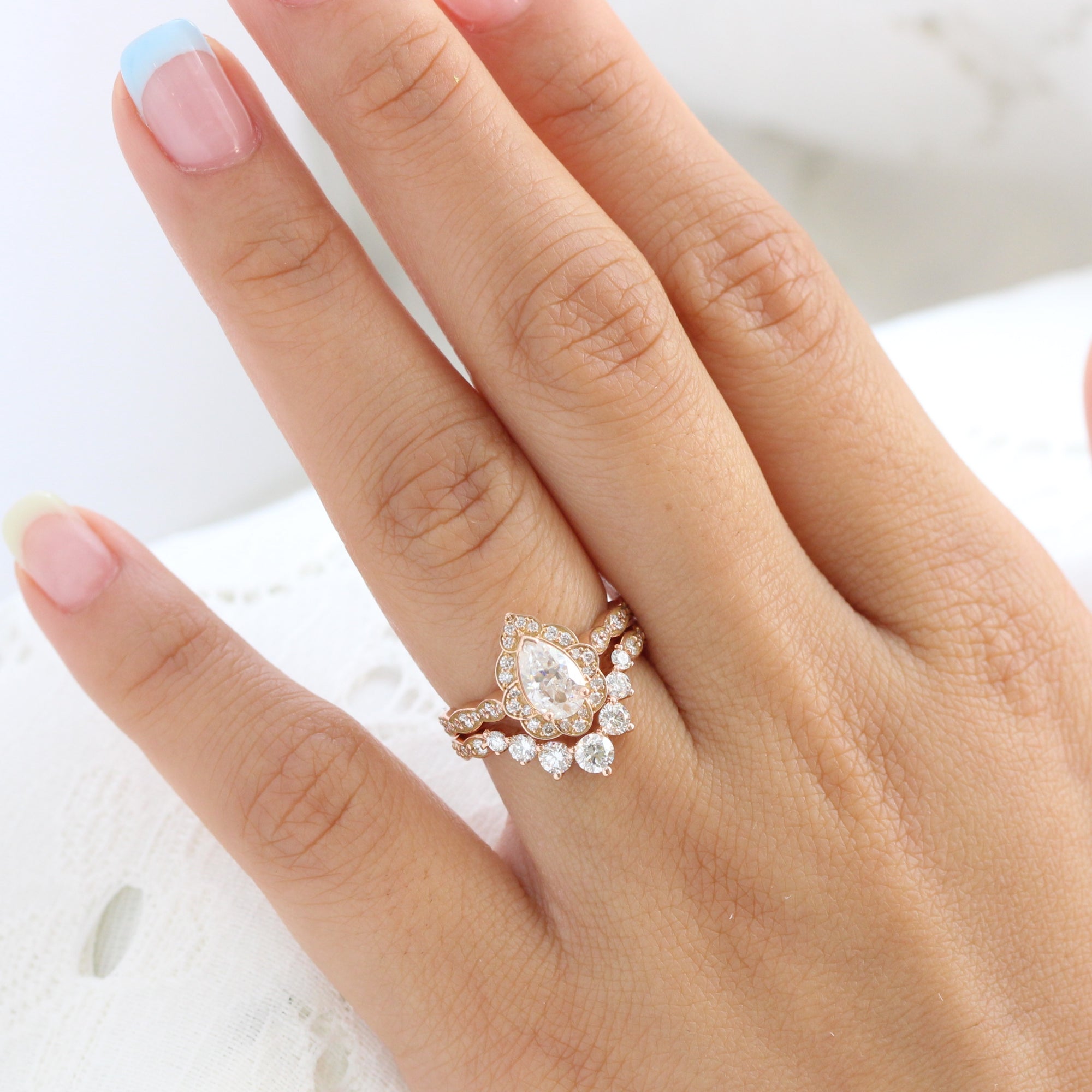 vintage floral pear moissanite ring bridal set rose gold large diamond curved wedding band la more design jewelry