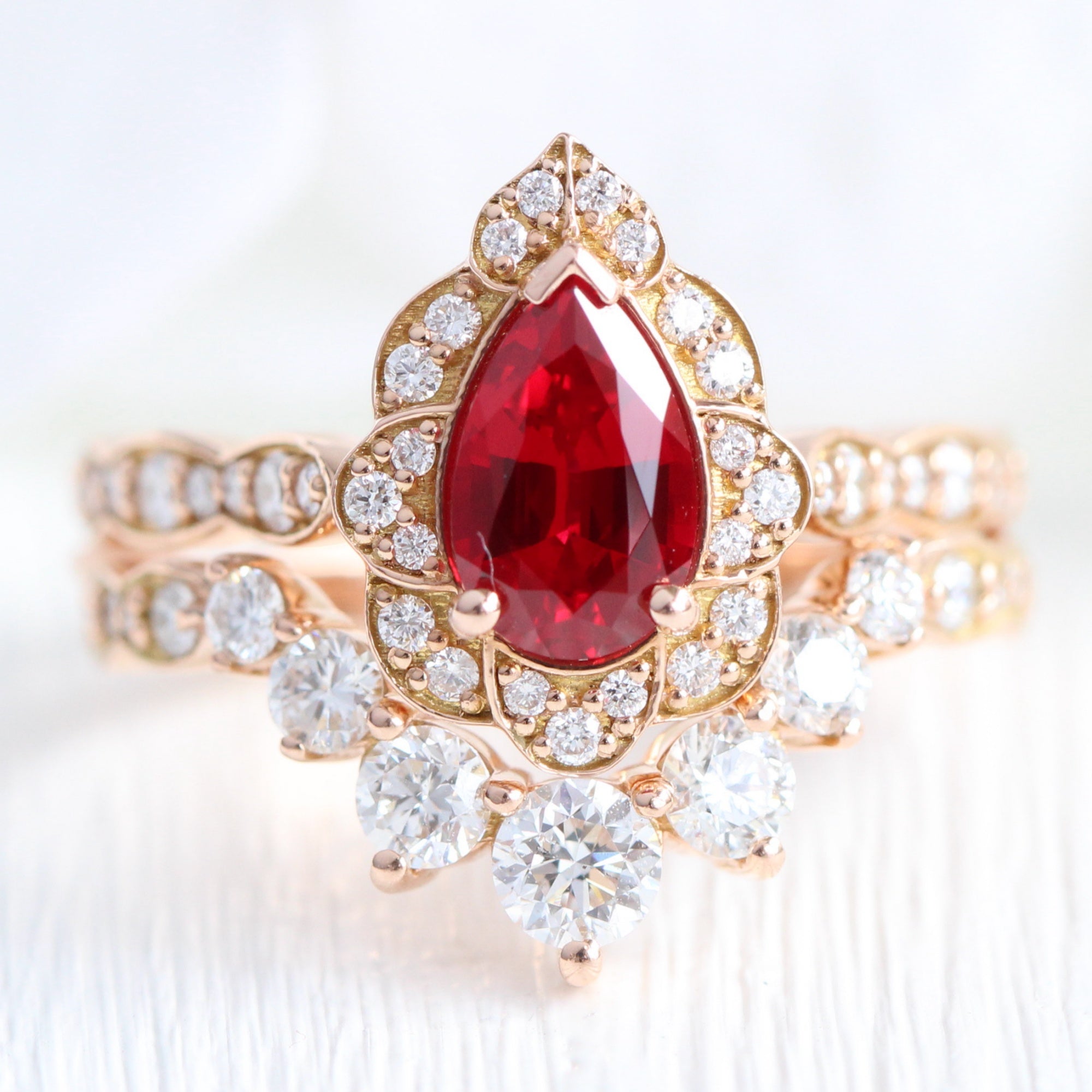 vintage halo diamond pear ruby ring stack rose gold curved diamond wedding band la more design jewelry-1