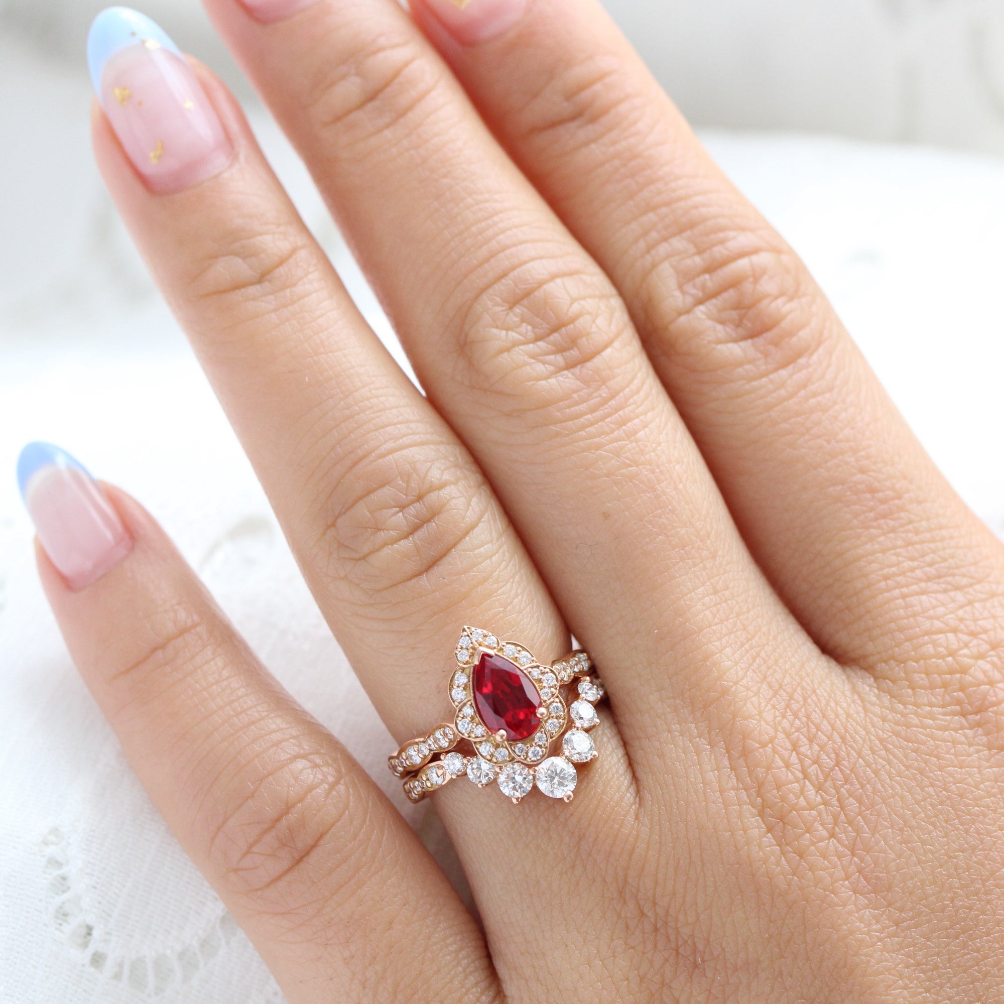 vintage halo diamond pear ruby ring stack rose gold curved diamond wedding band la more design jewelry