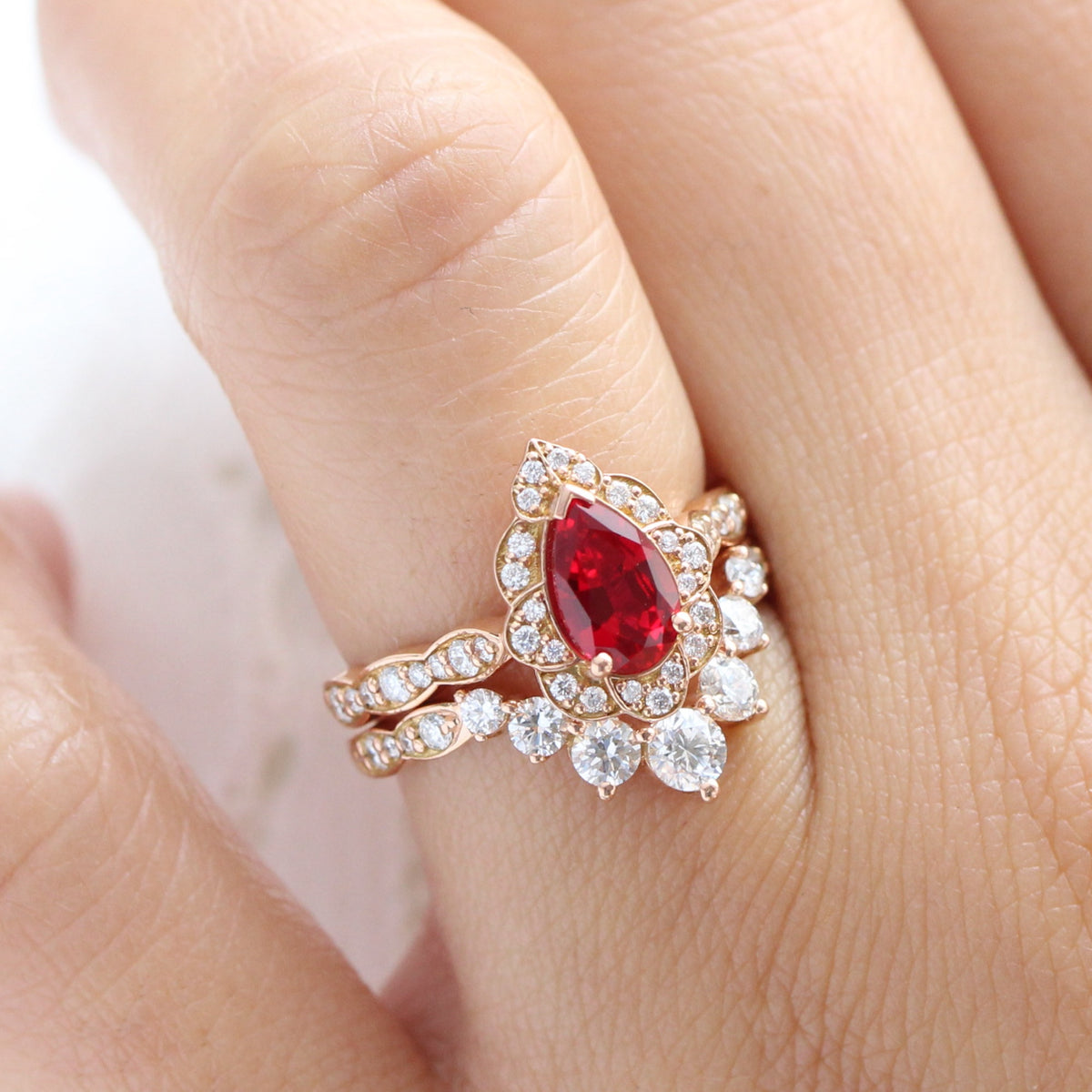 vintage halo diamond pear ruby ring stack rose gold curved diamond wedding band la more design jewelry