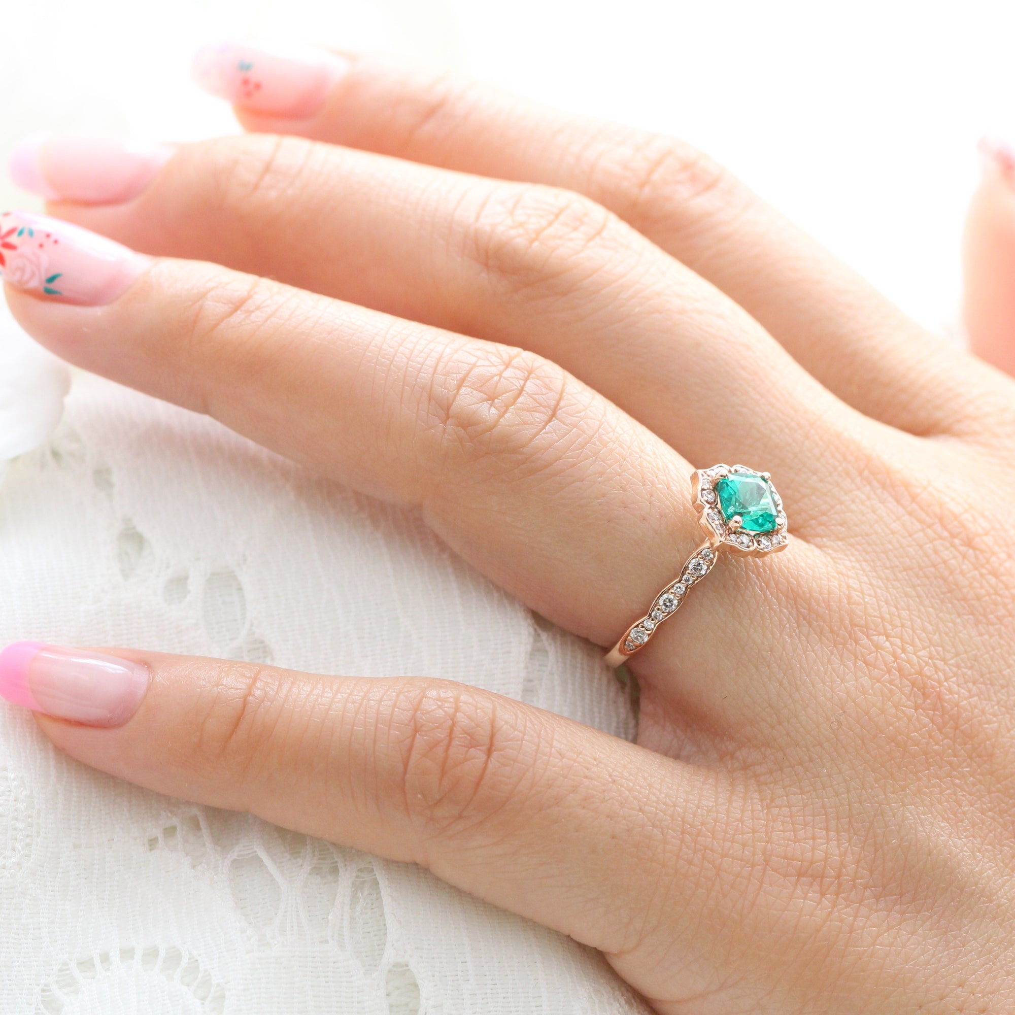 vintage inspired emerald engagement ring in rose gold diamond band by la more design jewelry